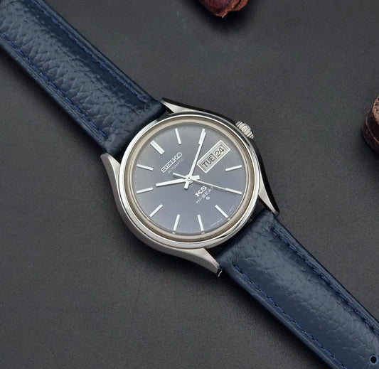 Vintage King Seiko Wristwatch 5626-7120 with blue leather strap on a dark background dial