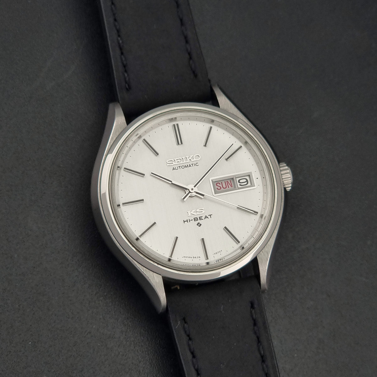 1973 vintage King Seiko 5626-7121 Hi-Beat automatic watch, front view highlighting the vertically brushed silver dial