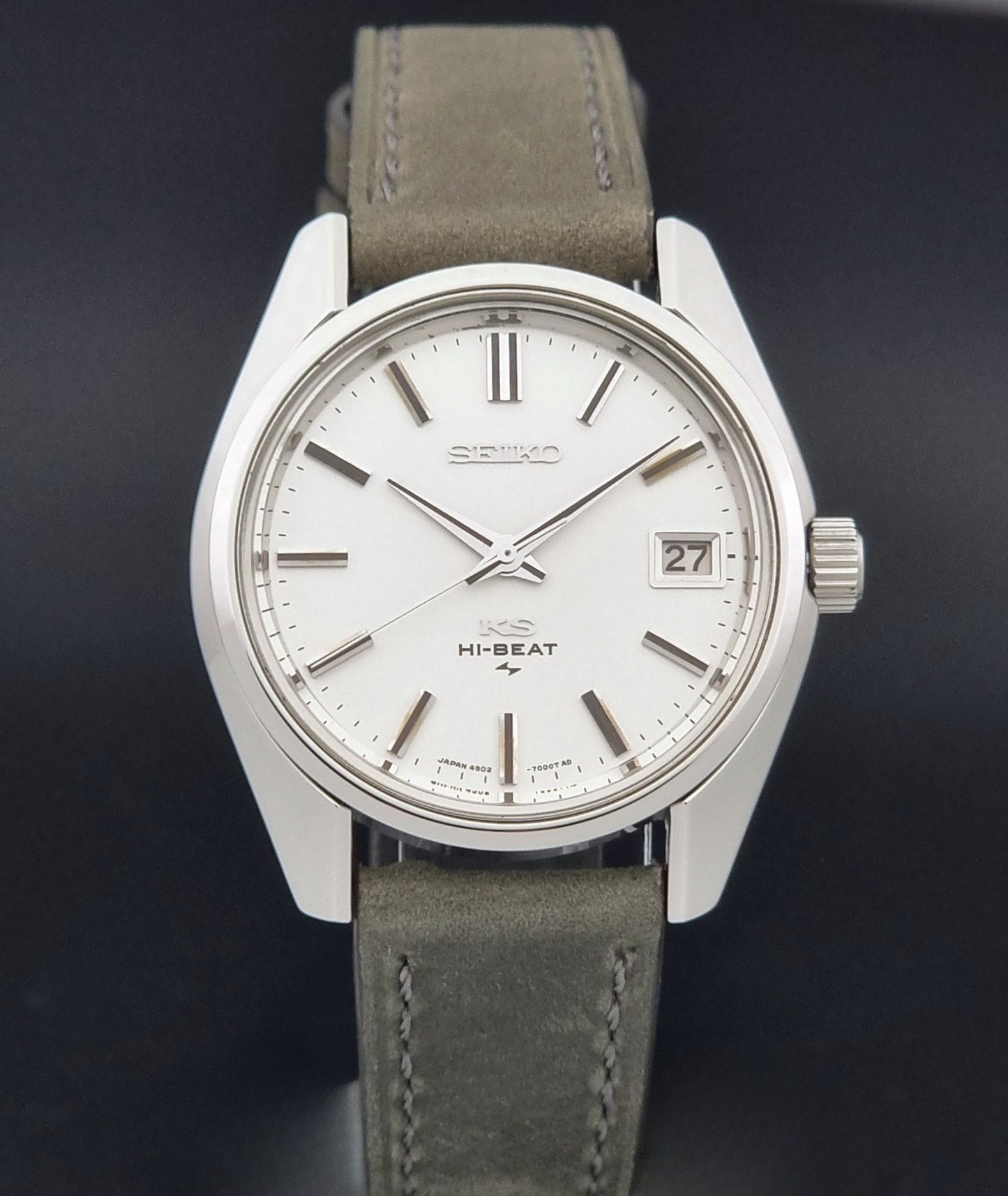 Vintage King Seiko 4502-7001 watch with a white dial on brown background close dial view