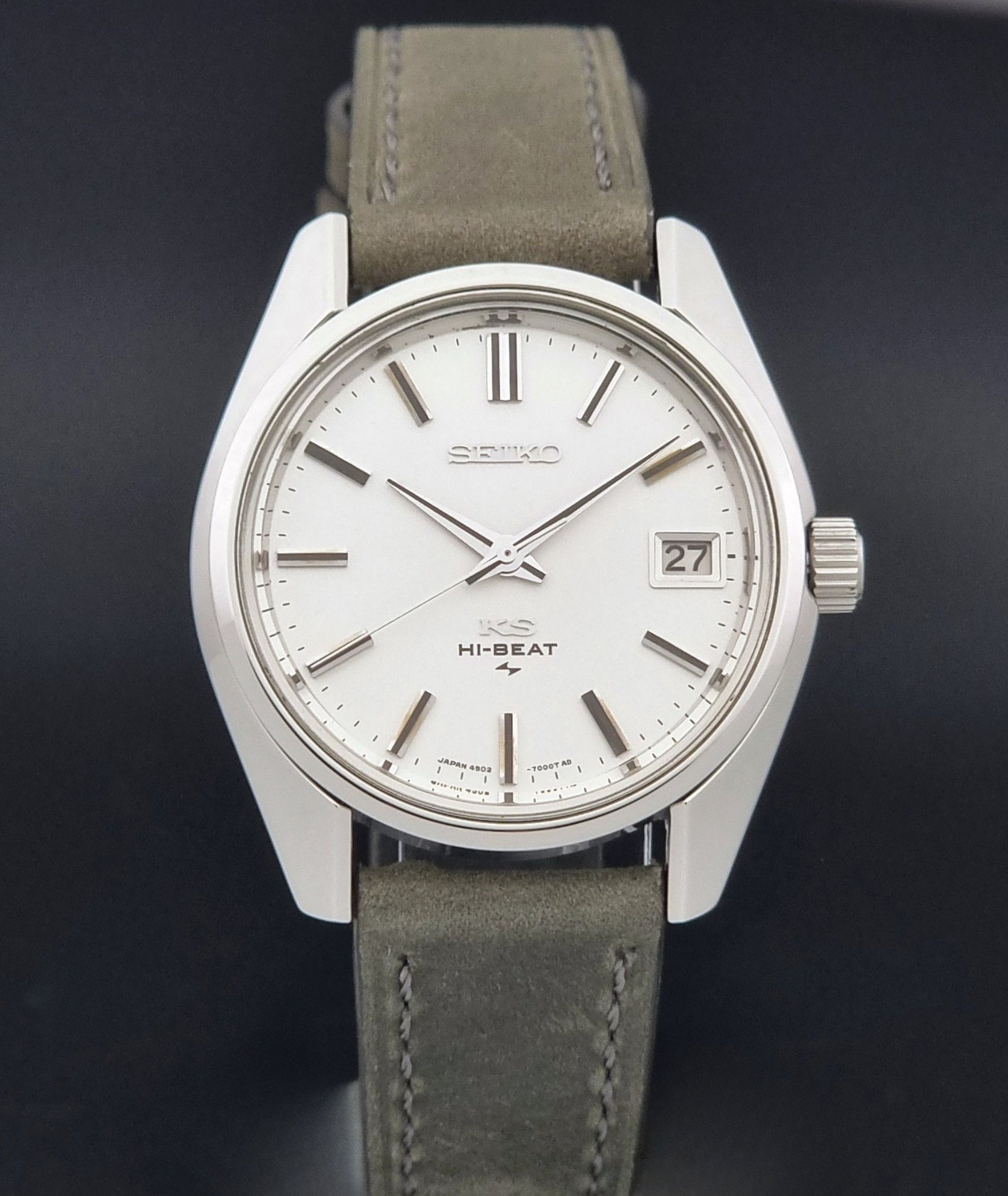 Vintage King Seiko 4502-7001 watch with a white dial on brown background close dial view
