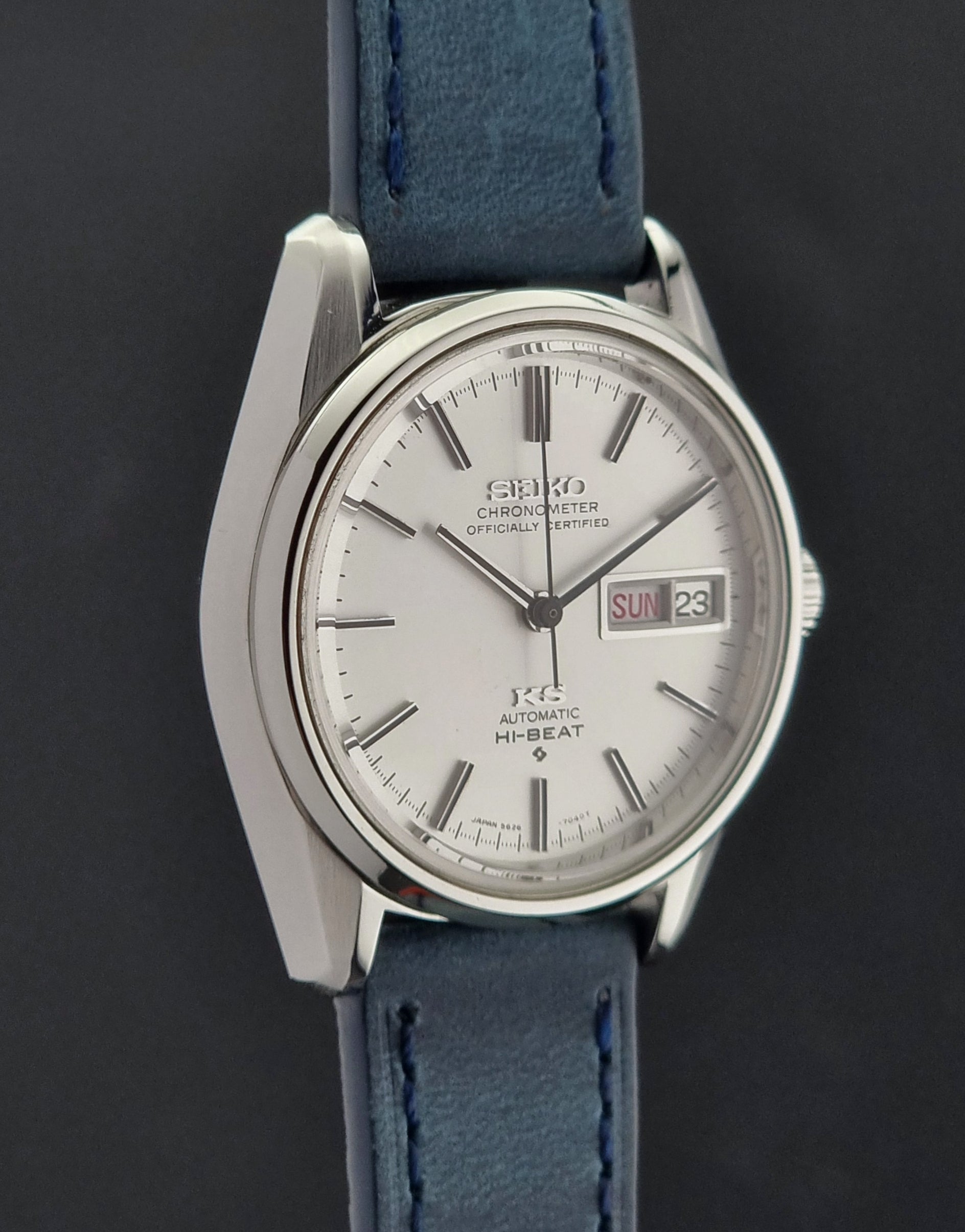 King Seiko Watch with blue strap and silver case on a dark background