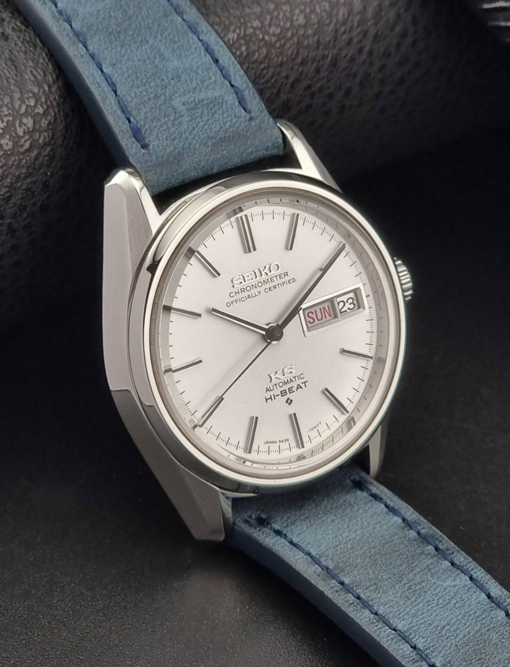 King Seiko Watch with blue strap and silver case on a dark background