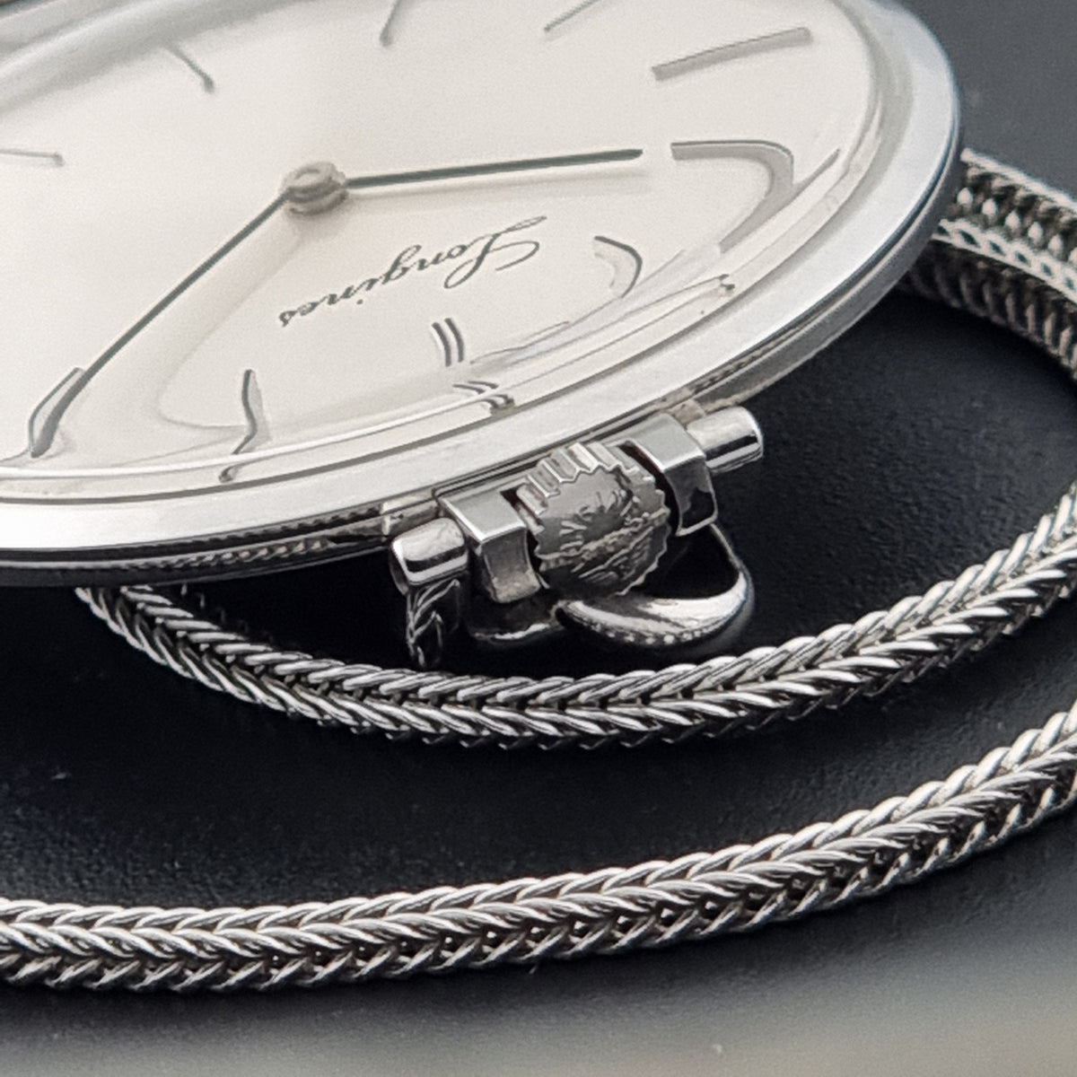 Circa 1976 vintage Longines 1097-4 pocket watch; crown view showing the winding crown and case profile
