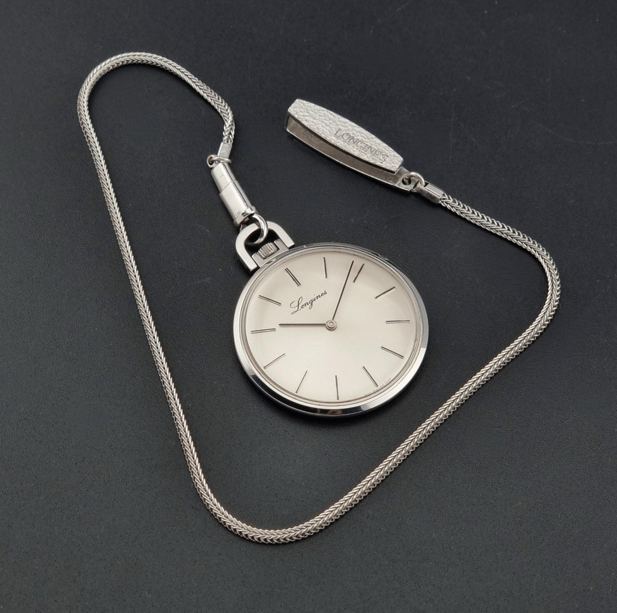 Circa 1976 vintage Longines 1097-4 pocket watch; detailed front view showing the dial, hands and case