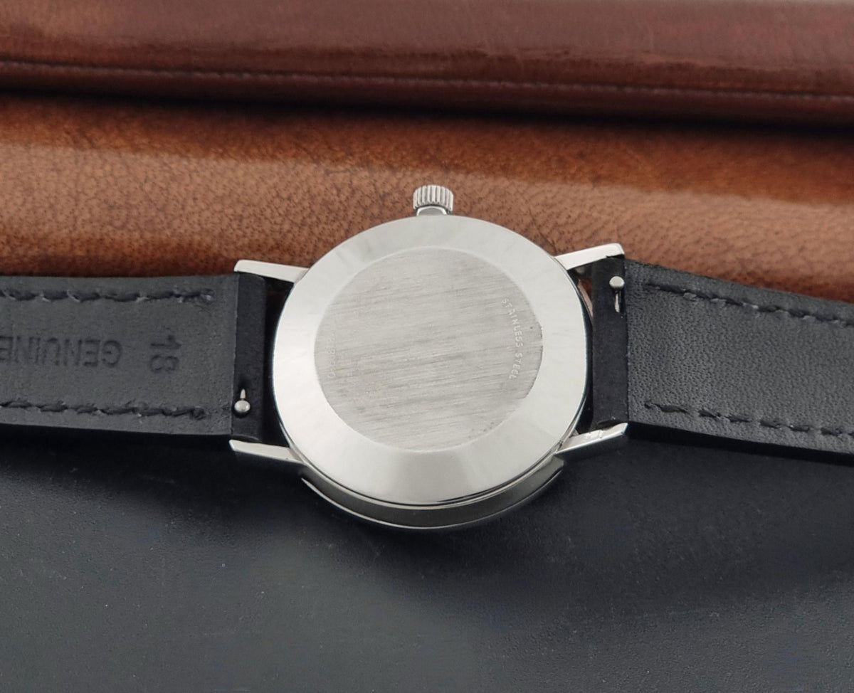 1977 vintage Longines 1118 automatic date watch, rear view of the stainless steel caseback
