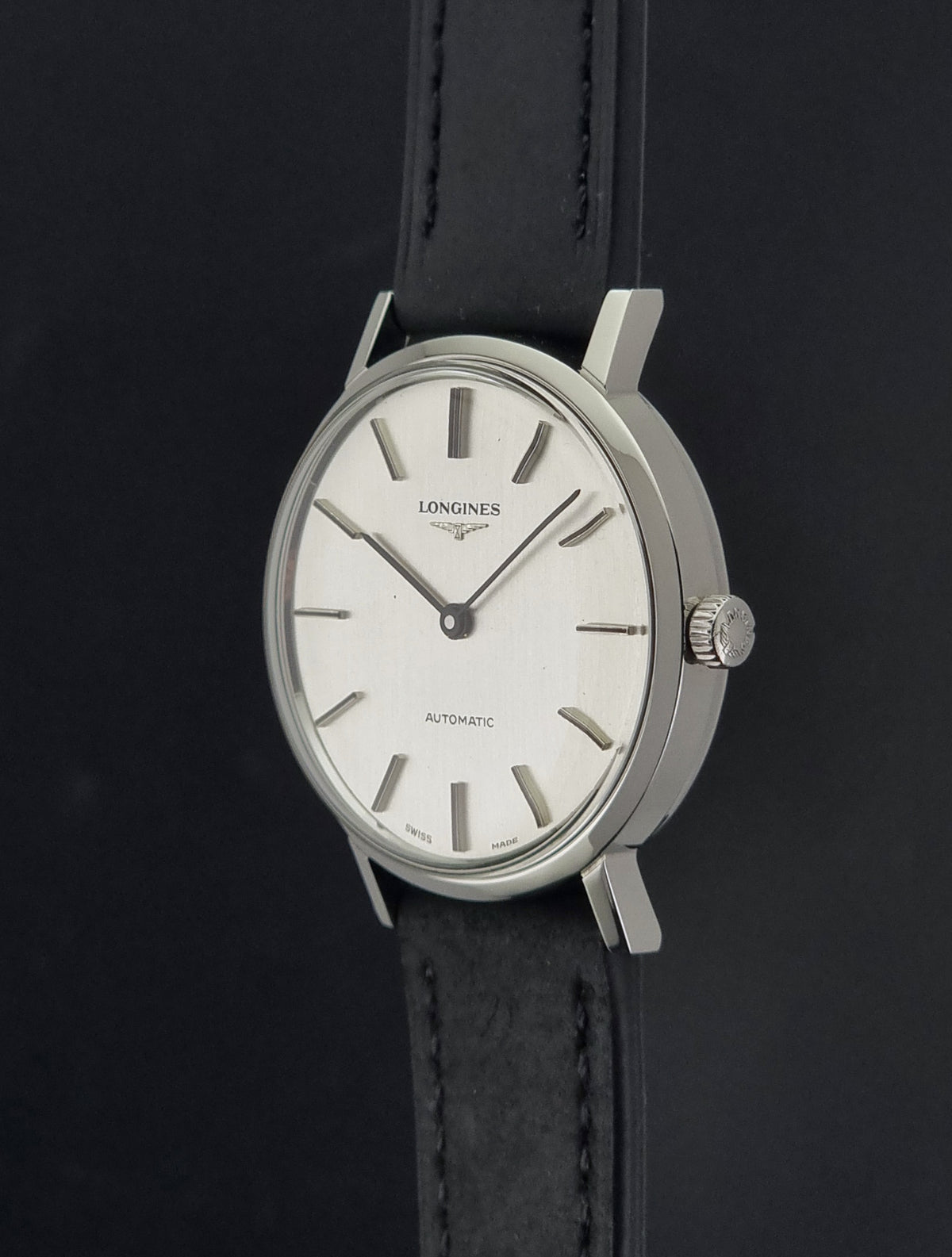 1975 vintage Longines 3029-1 automatic watch, close-up showing the crown and adjacent case flank