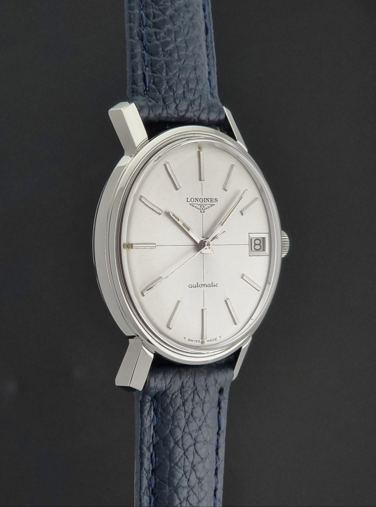 1966 vintage Longines 7570-5 automatic watch, opposite side profile showing the case shape and lugs