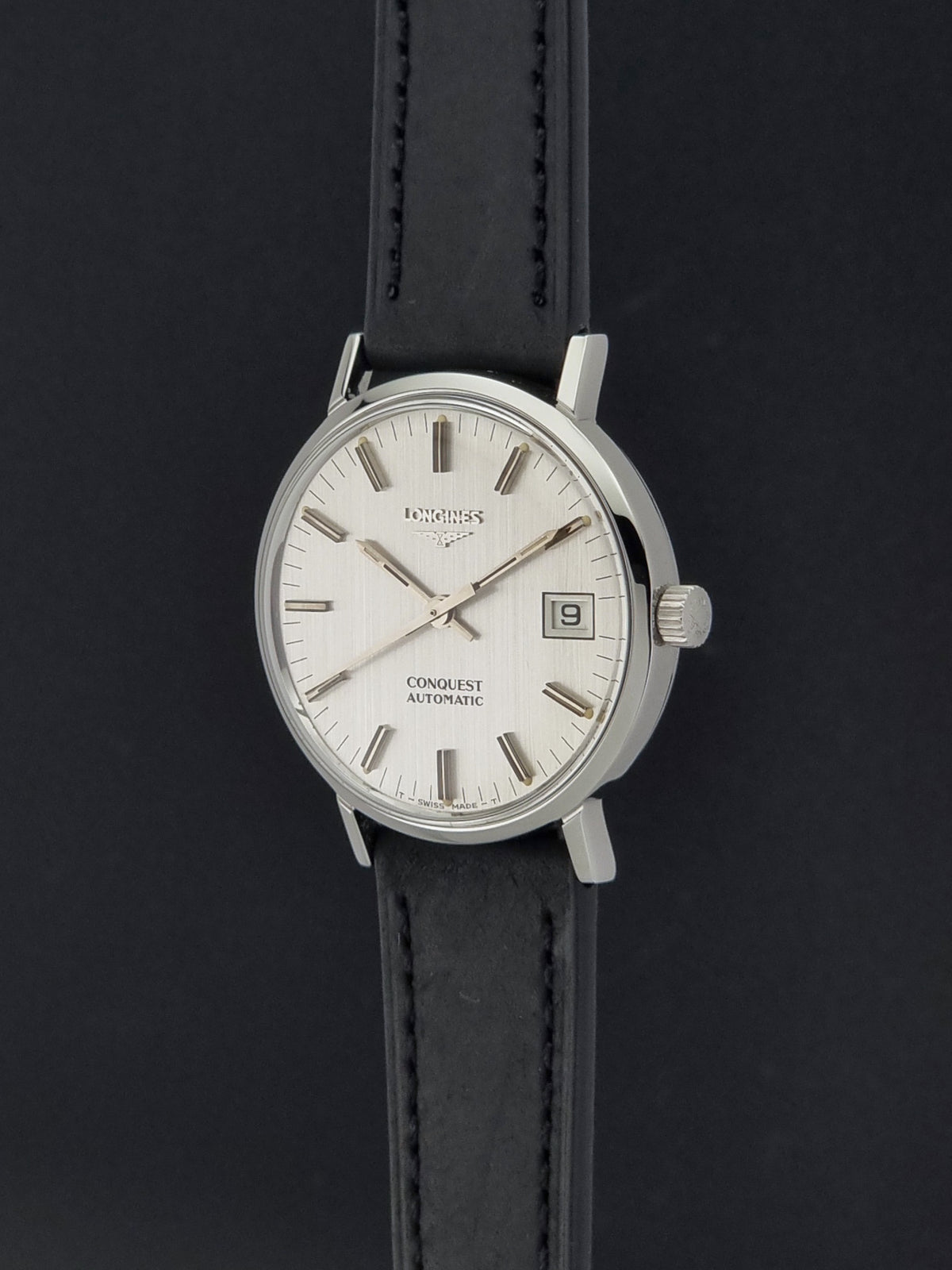 Vintage Longines Conquest 1568-1 automatic date watch from 1975, crown profile