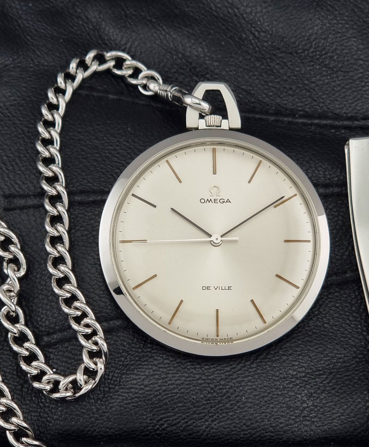 Vintage Omega De Ville Pocket Watch 131.1714 on a dark background front view