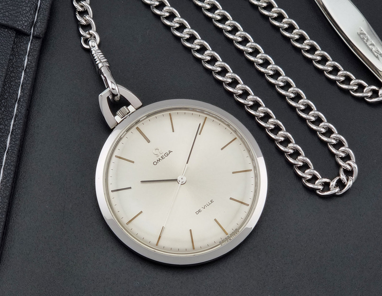 Vintage Omega De Ville Pocket Watch 131.1714 on a dark background dial
