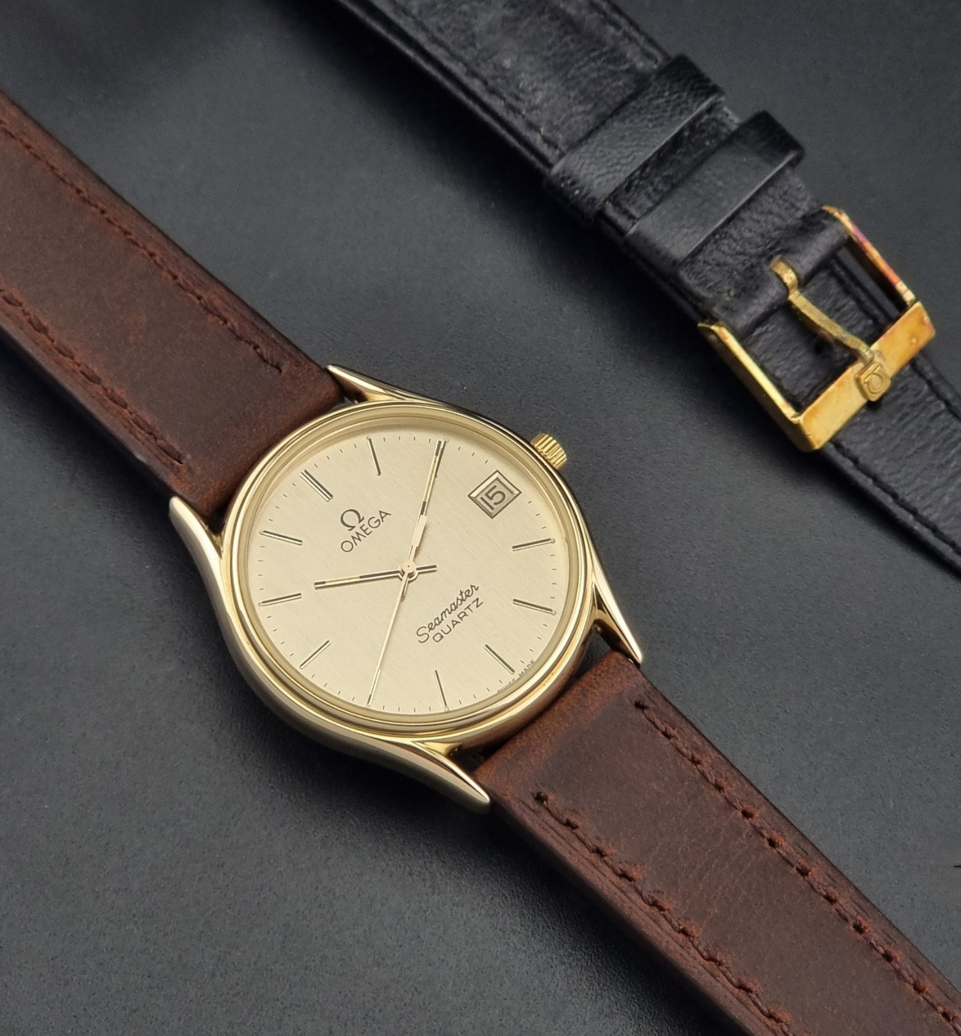 Vintage Omega Quartz Seamaster 196.0281 Wristwatch in a gold case dial