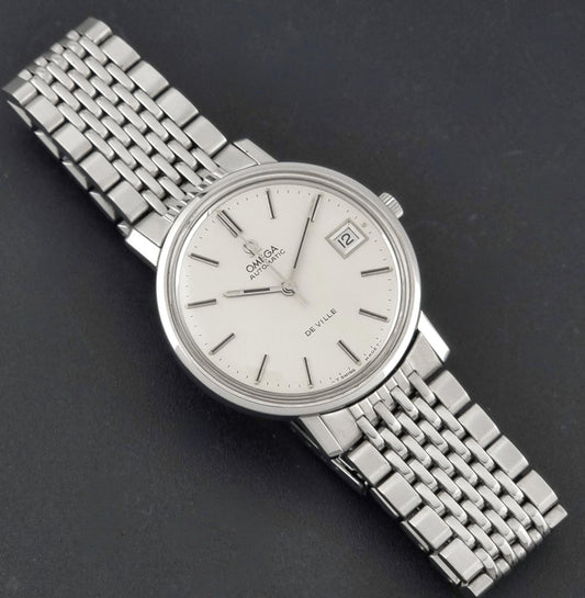 Vintage Omega De Ville 166.0161 Automatic Date circa 1973, front view of the dial and case, on a stainless steel bracelet