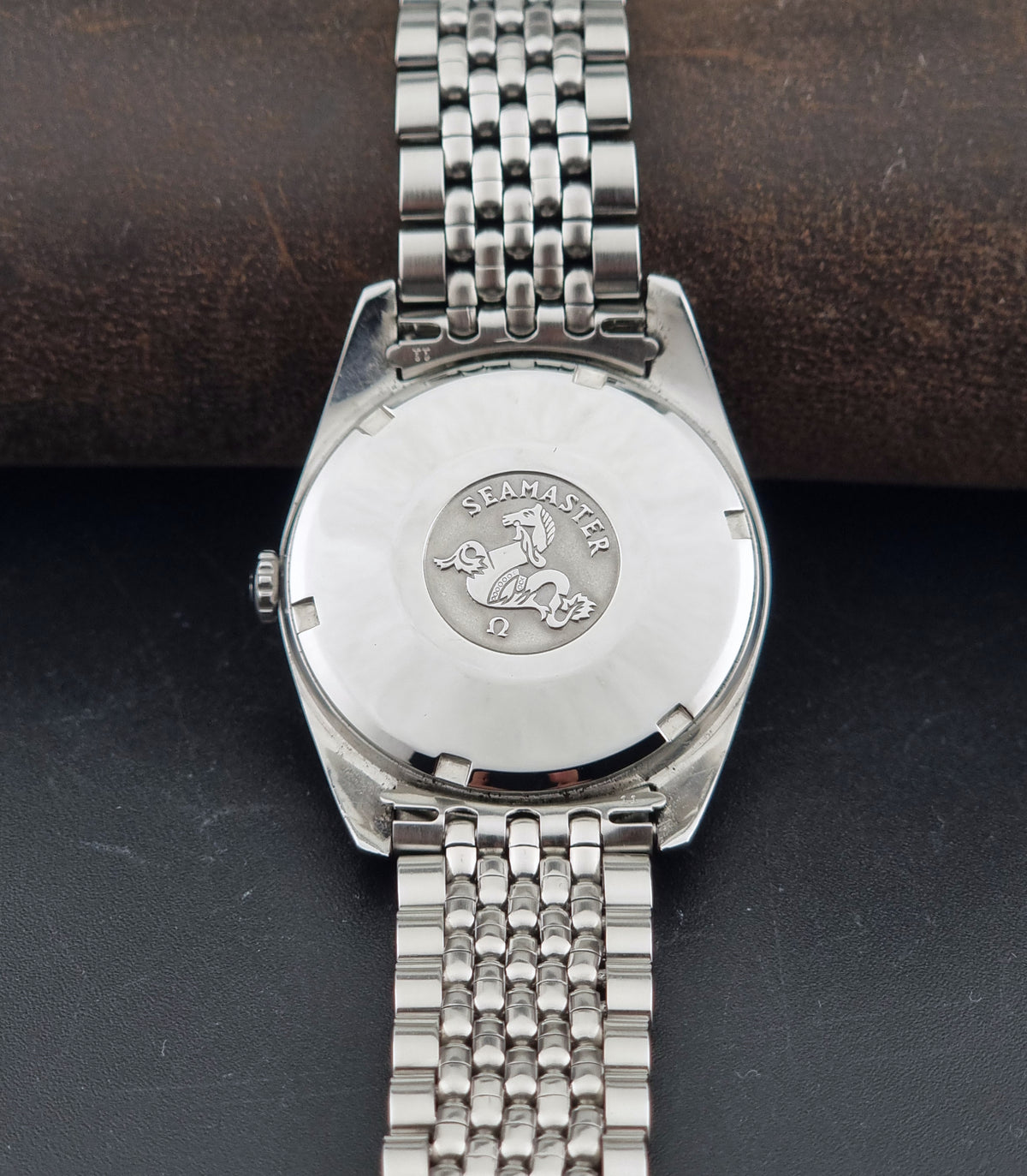 1966 vintage Omega Seamaster 166.010 automatic watch, rear view of the stainless steel caseback