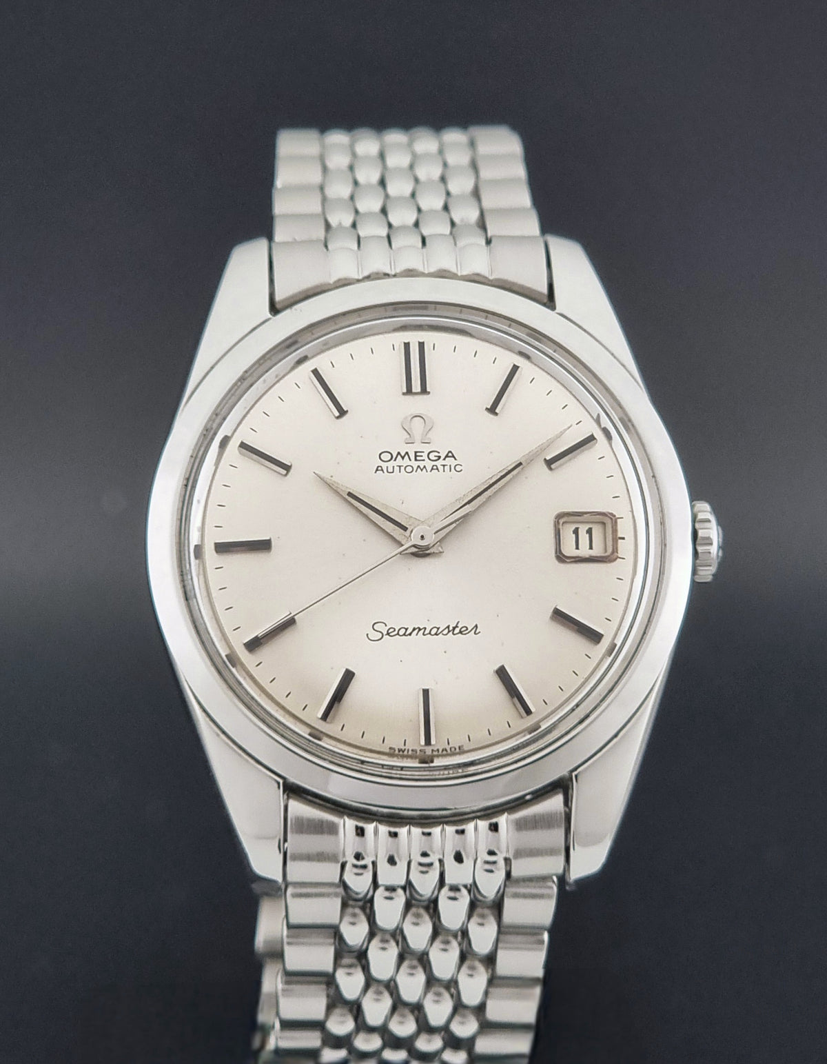 1966 vintage Omega Seamaster 166.010 automatic watch, dial detail showing applied markers and date window