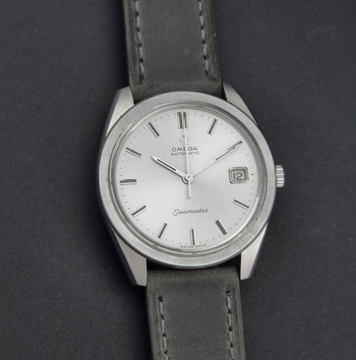 Vintage Omega Seamaster 166.028 automatic watch from 1968, angled front view