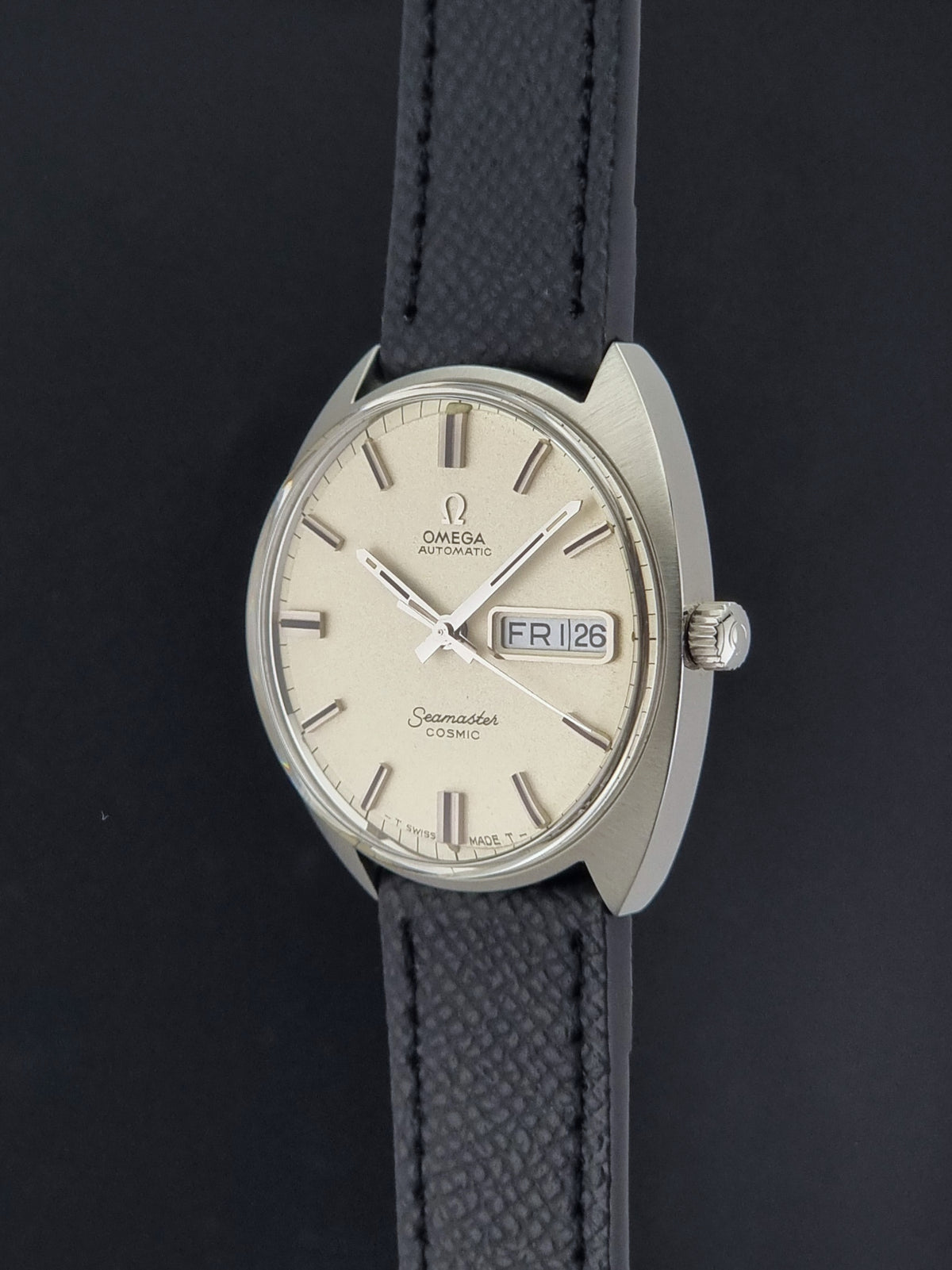 1970 vintage Omega Seamaster Cosmic 166.036 automatic watch, close-up showing the crown and adjacent case flank