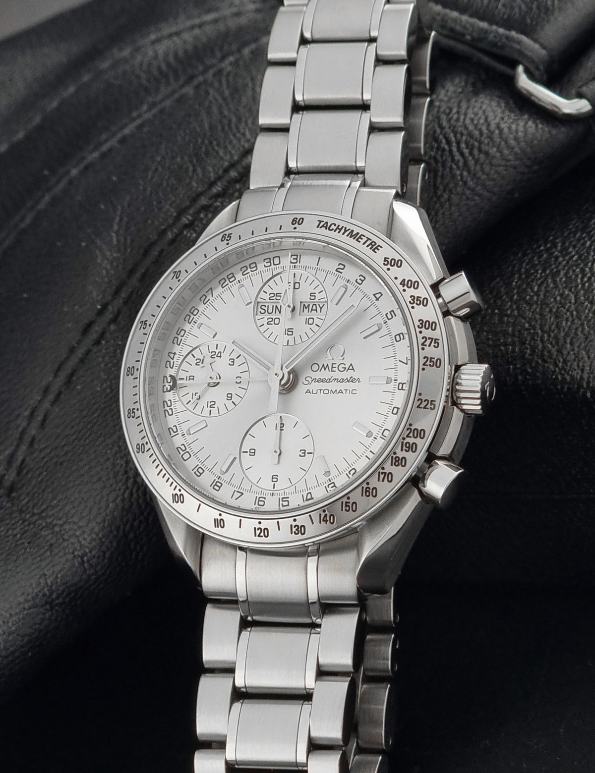 1999 Omega Speedmaster 3523.30 Triple Date automatic chronograph, crown-side view of the winding crown and case