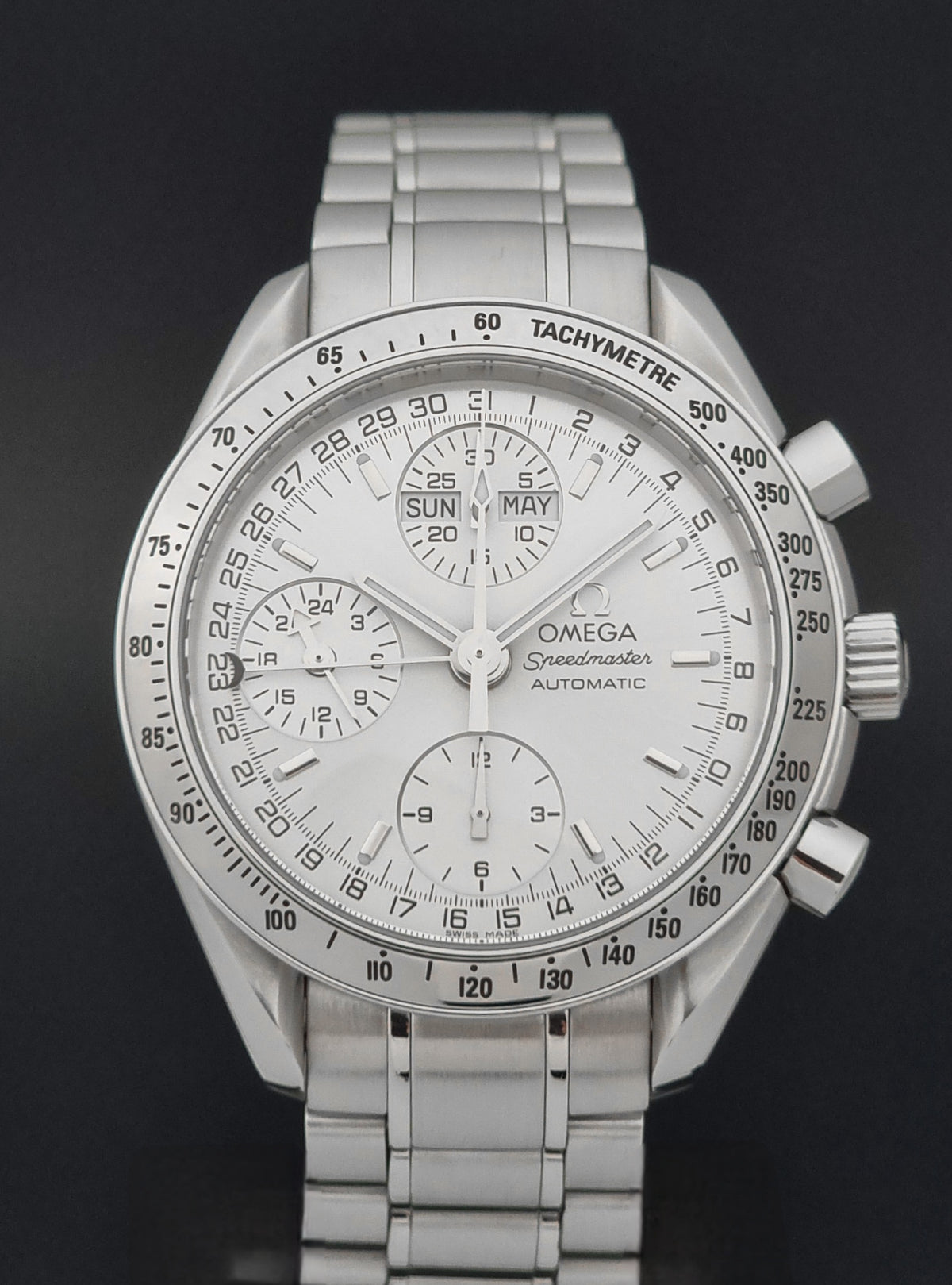1999 Omega Speedmaster 3523.30 Triple Date automatic chronograph, dial detail showing three subdials, calendar displays and tachymeter bezel
