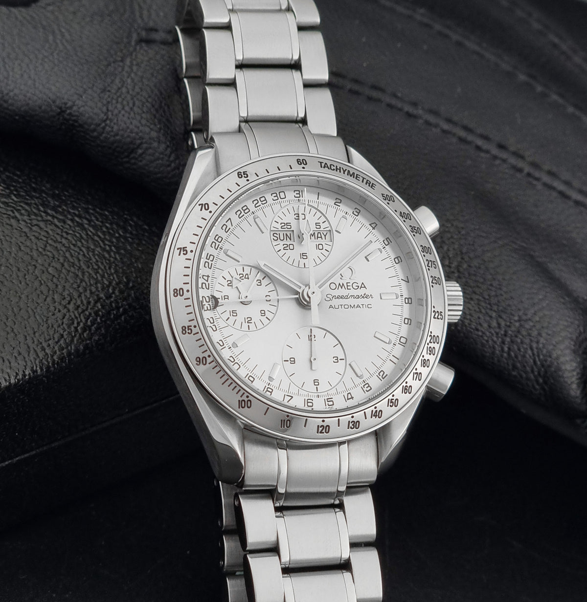 1999 Omega Speedmaster 3523.30 Triple Date automatic chronograph, side profile showing the case, lugs and thickness