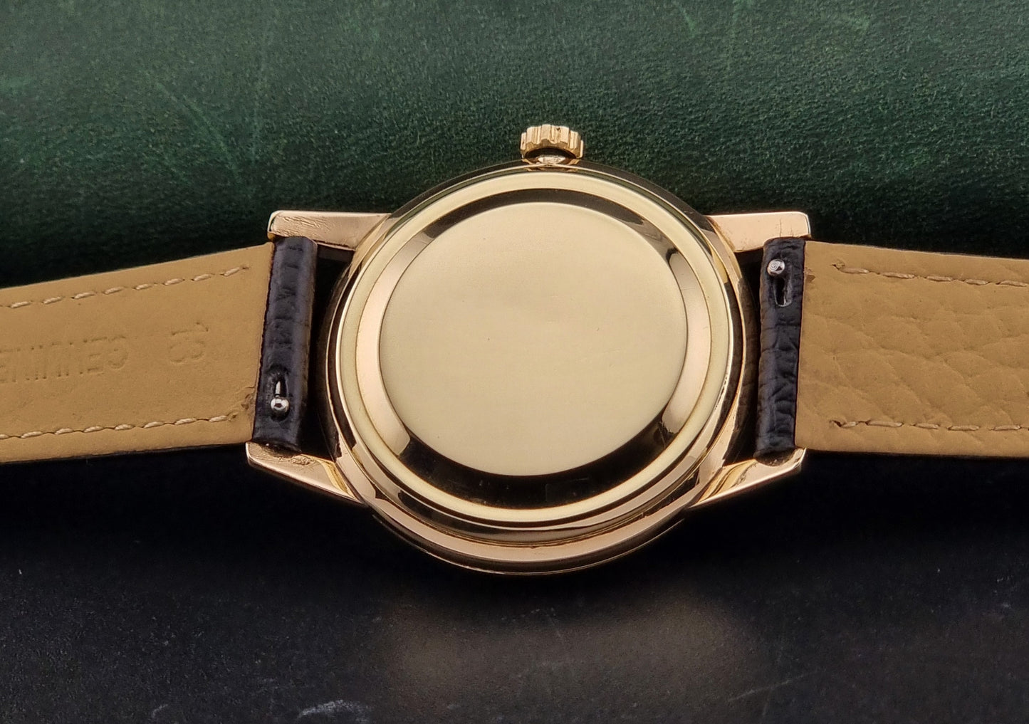 Vintage Seiko watch Lord Marvel 15023E gold filled on a dark background case back view