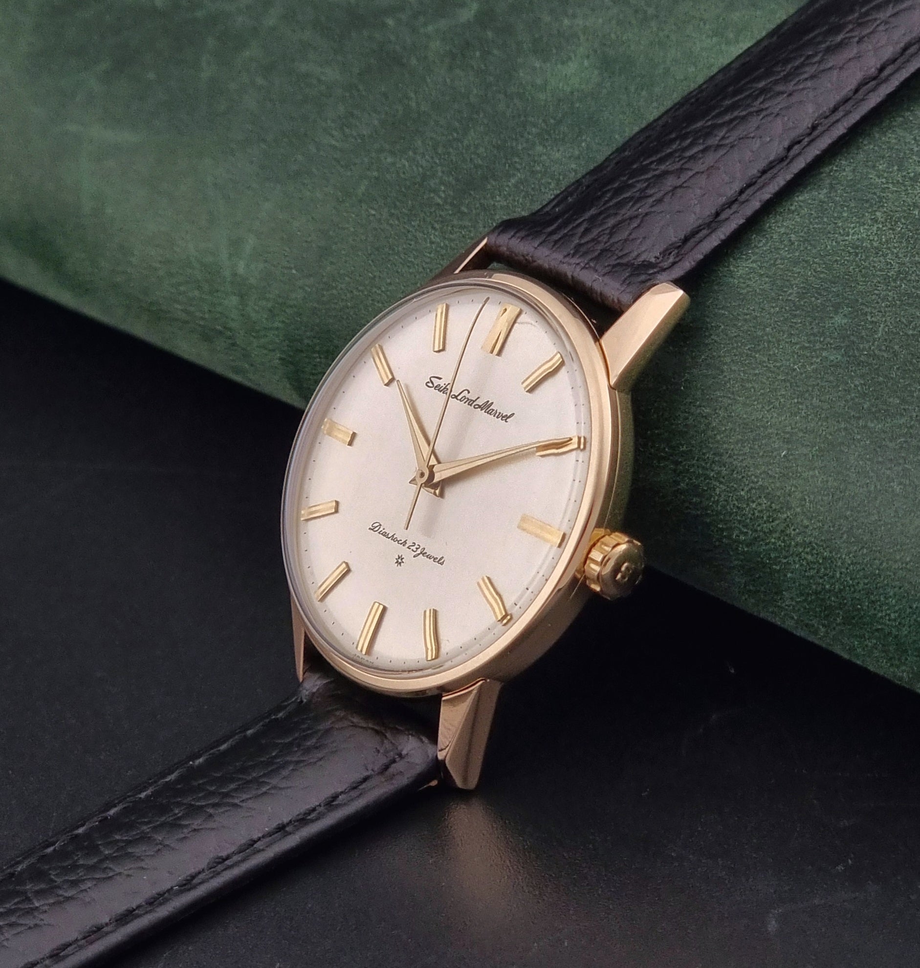 Vintage Seiko watch Lord Marvel 15023E gold filled on a dark background crown view