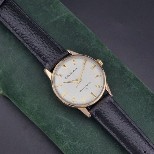 Vintage Seiko watch Lord Marvel 15023E gold filled on a dark background dial