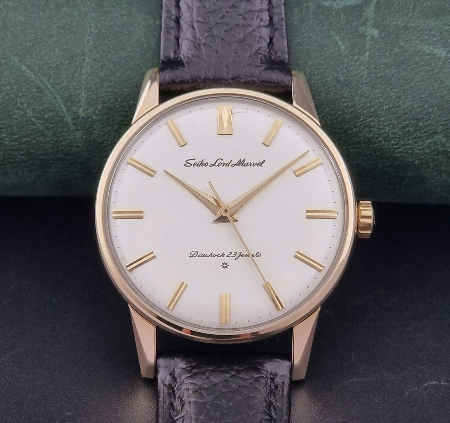 Vintage Seiko watch Lord Marvel 15023E gold filled on a dark background front view