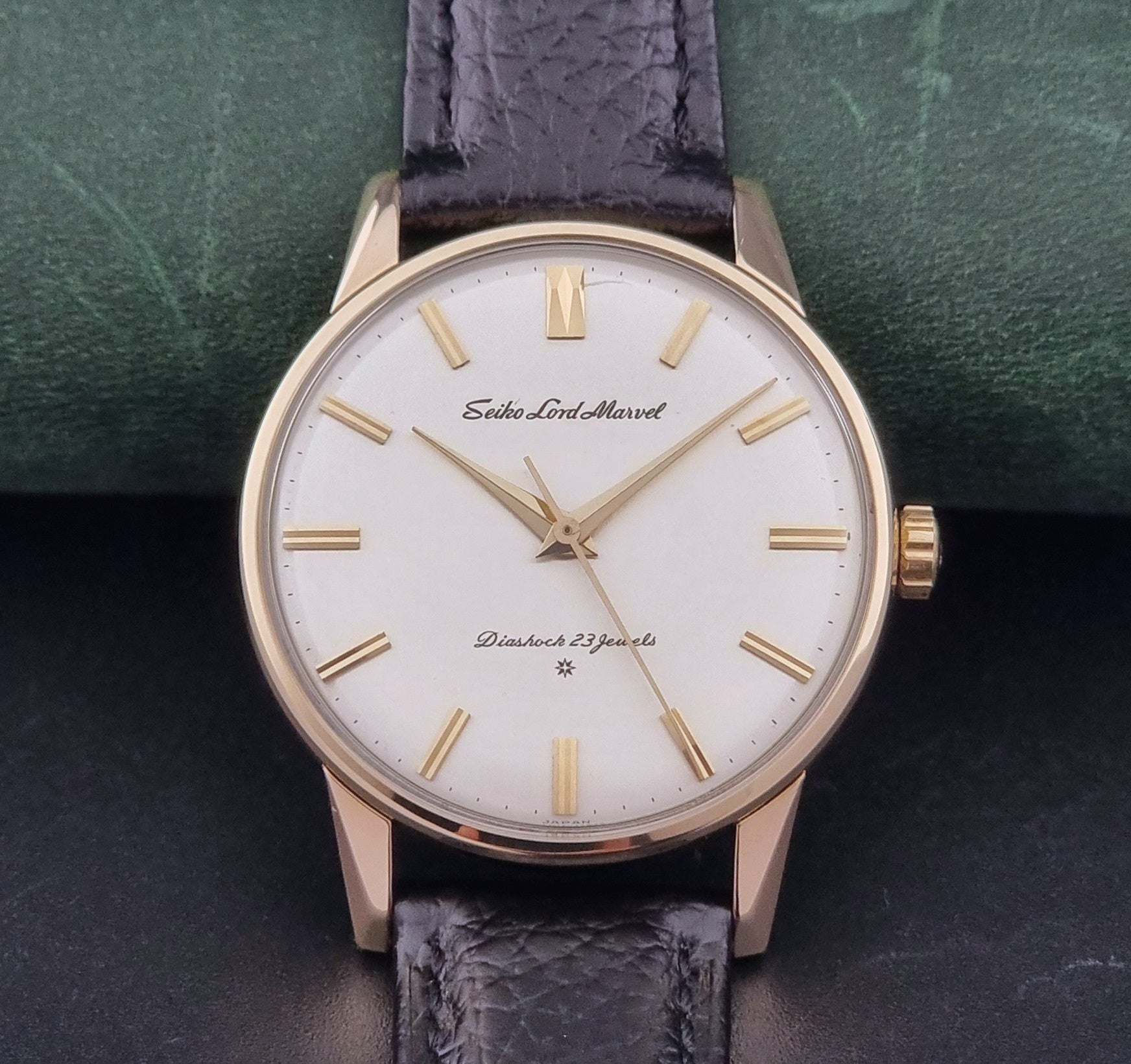 Vintage Seiko watch Lord Marvel 15023E gold filled on a dark background front view