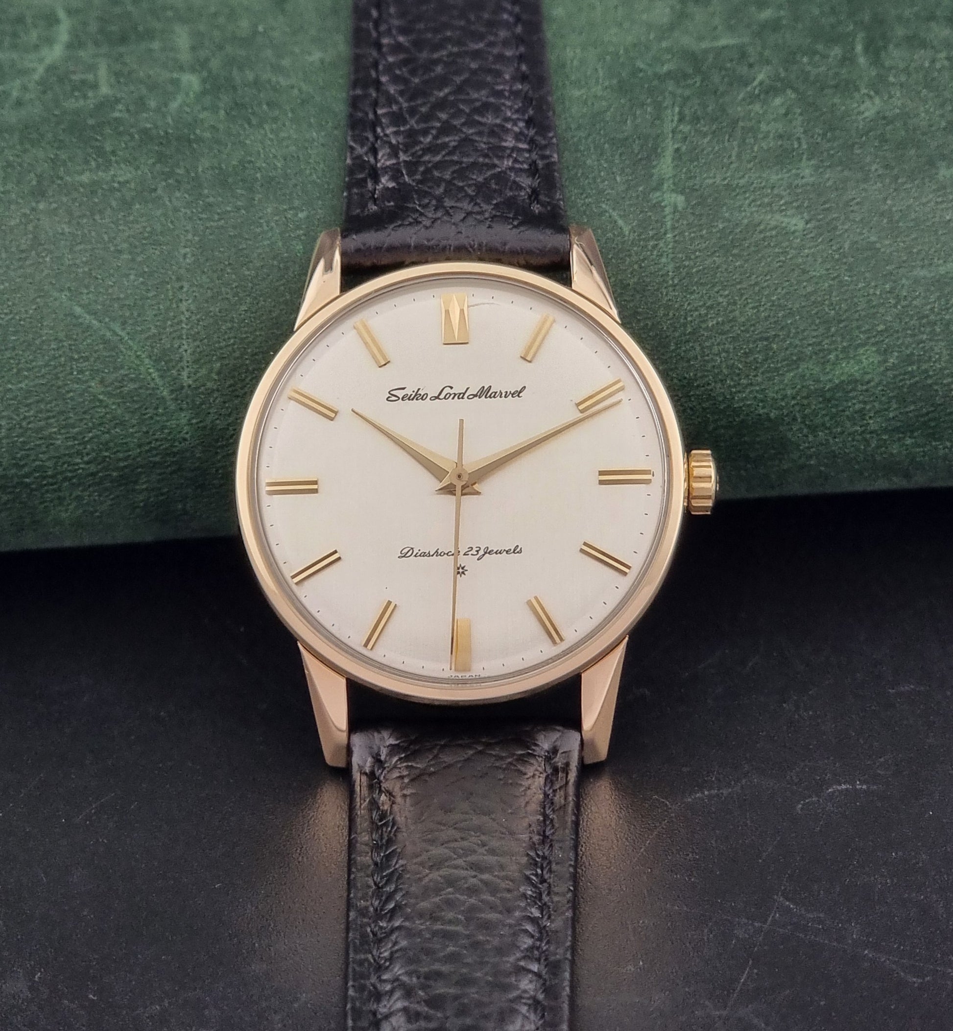 Vintage Seiko watch Lord Marvel 15023E gold filled on a dark background dial view