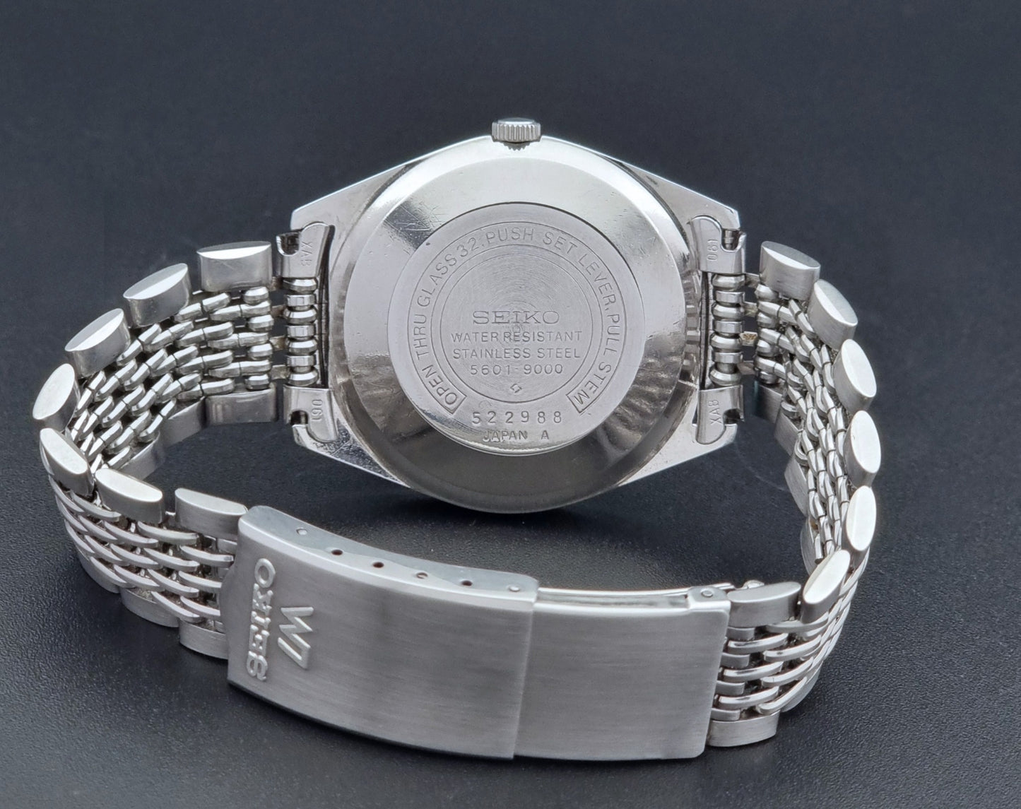 Vintage Seiko watch LordMatic 5601-9000  on a dark background reverse