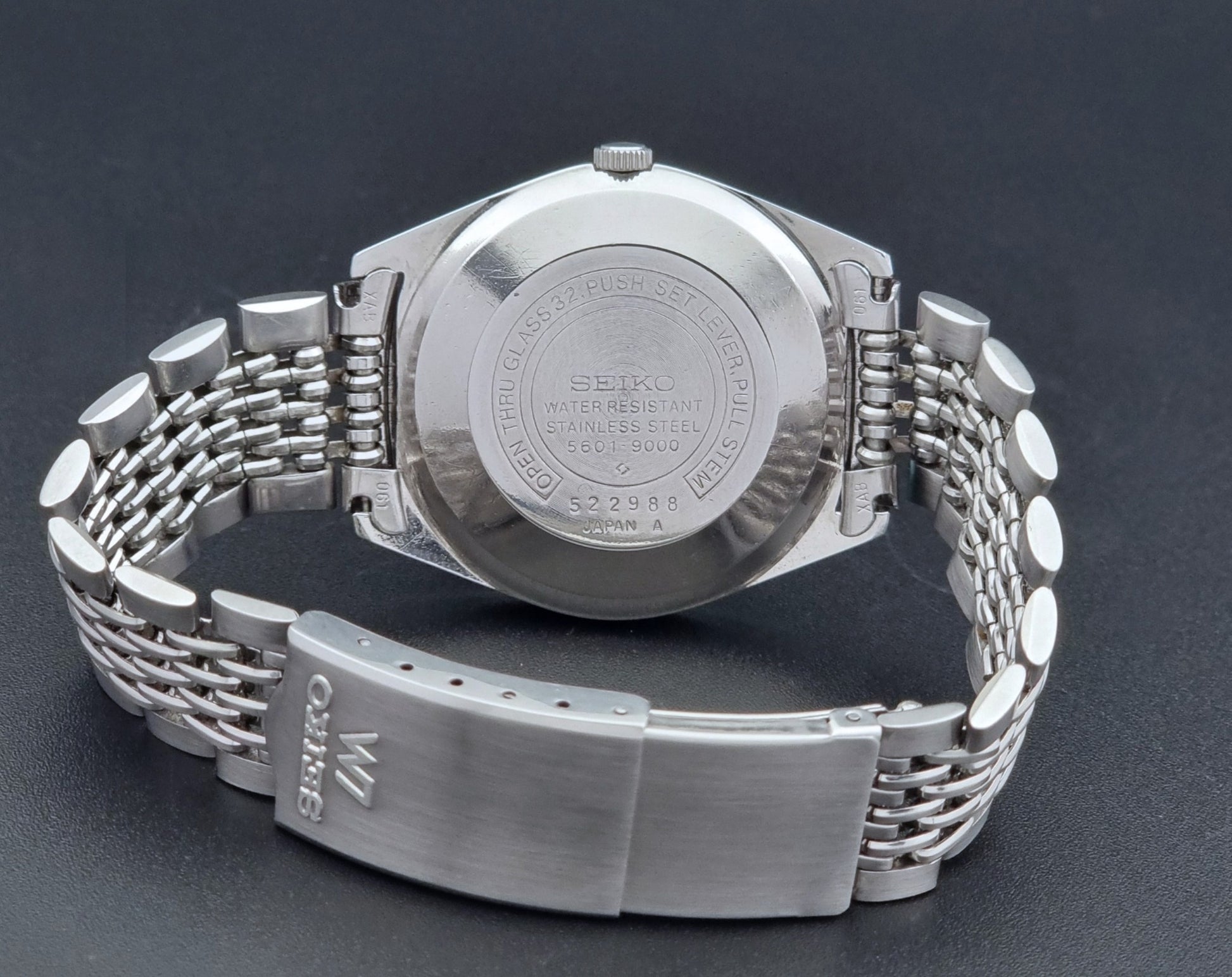 Vintage Seiko watch LordMatic 5601-9000  on a dark background reverse