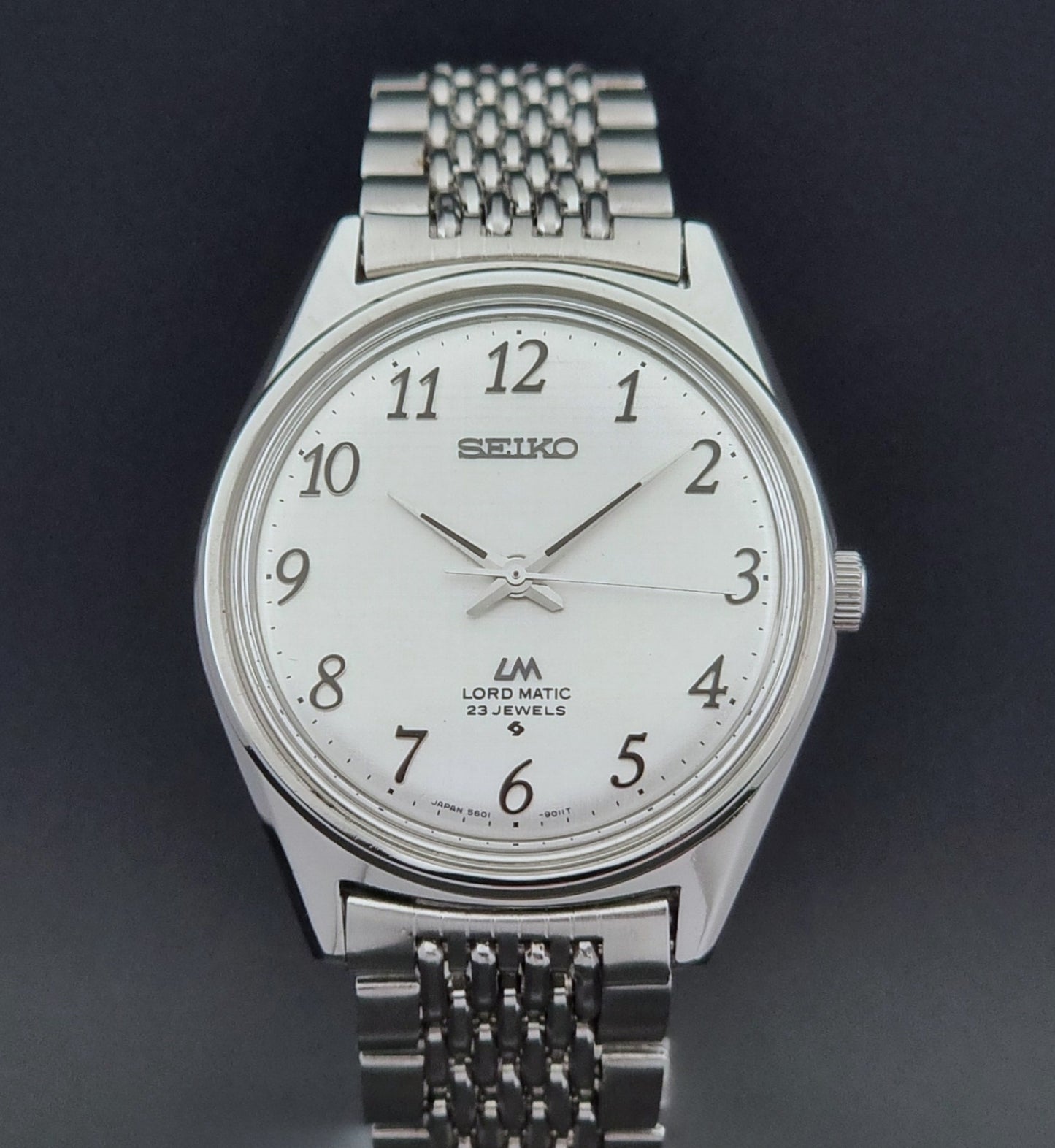 Vintage Seiko watch LordMatic 5601-9000  on a dark background close up