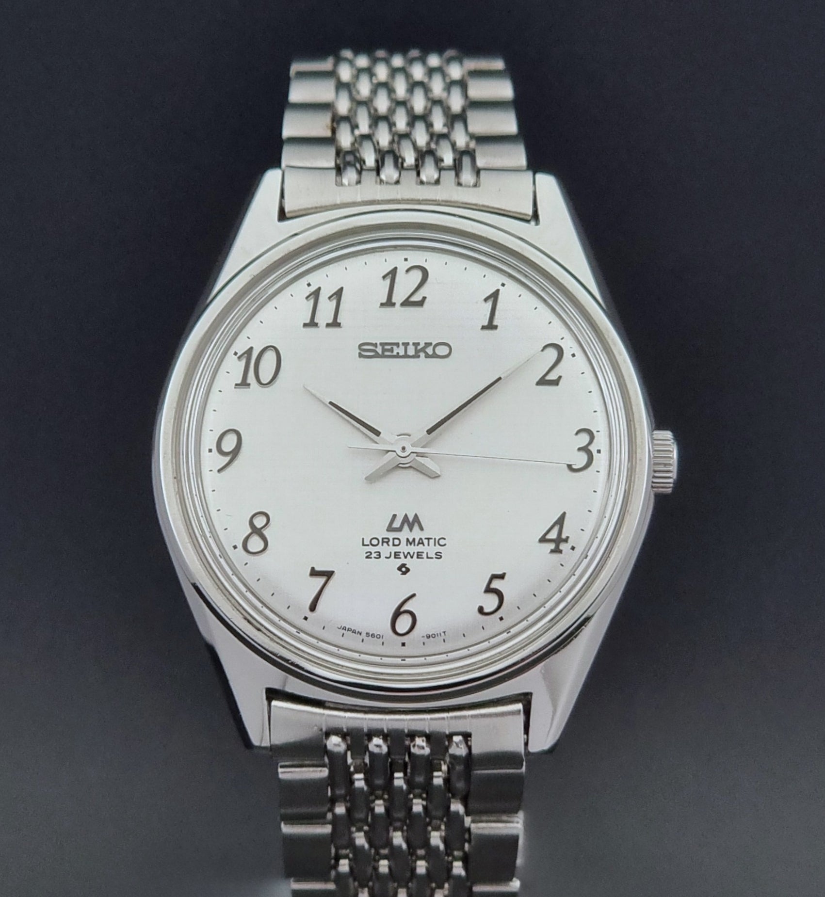 Vintage Seiko watch LordMatic 5601-9000  on a dark background close up