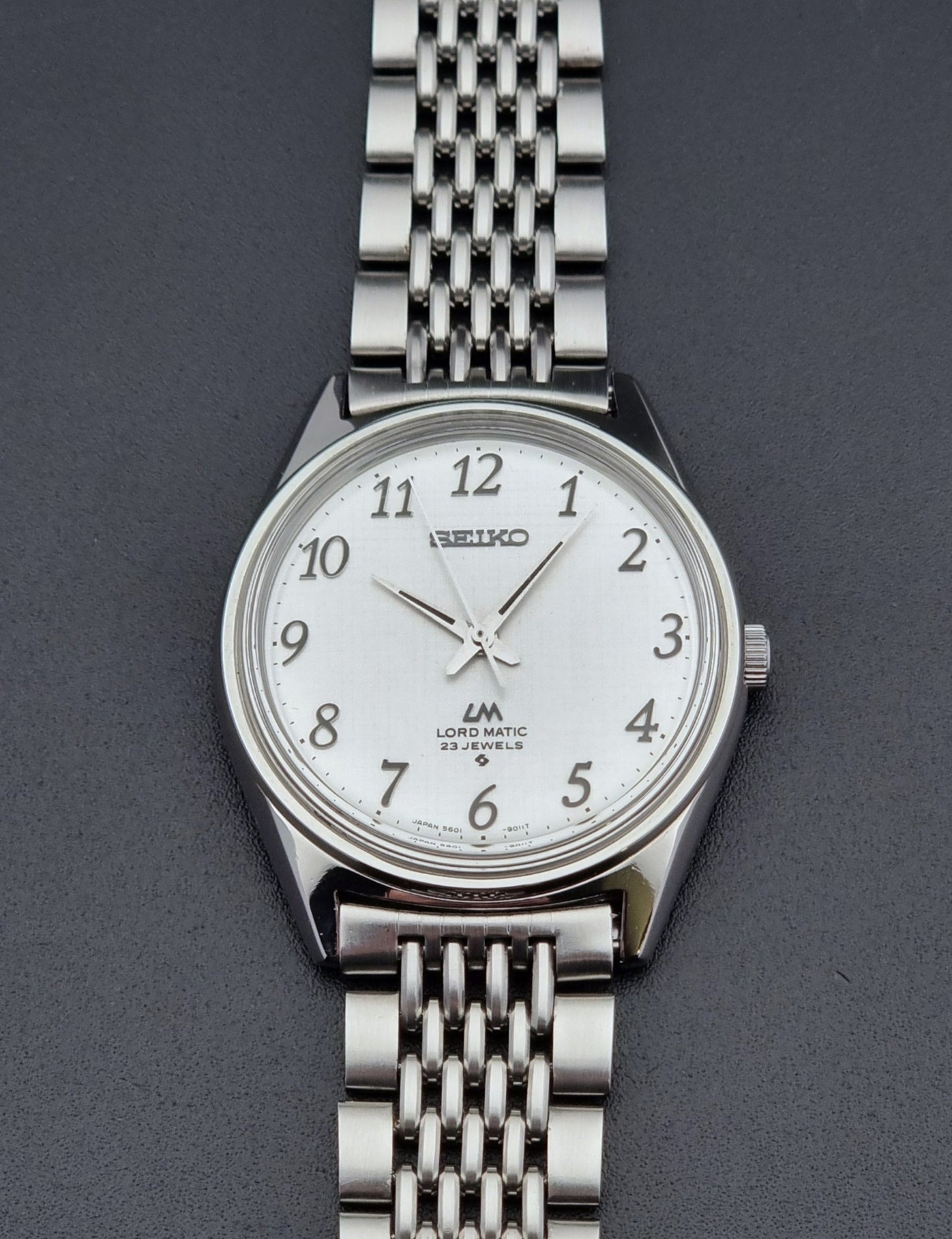 Vintage Seiko watch LordMatic 5601-9000  on a dark background front