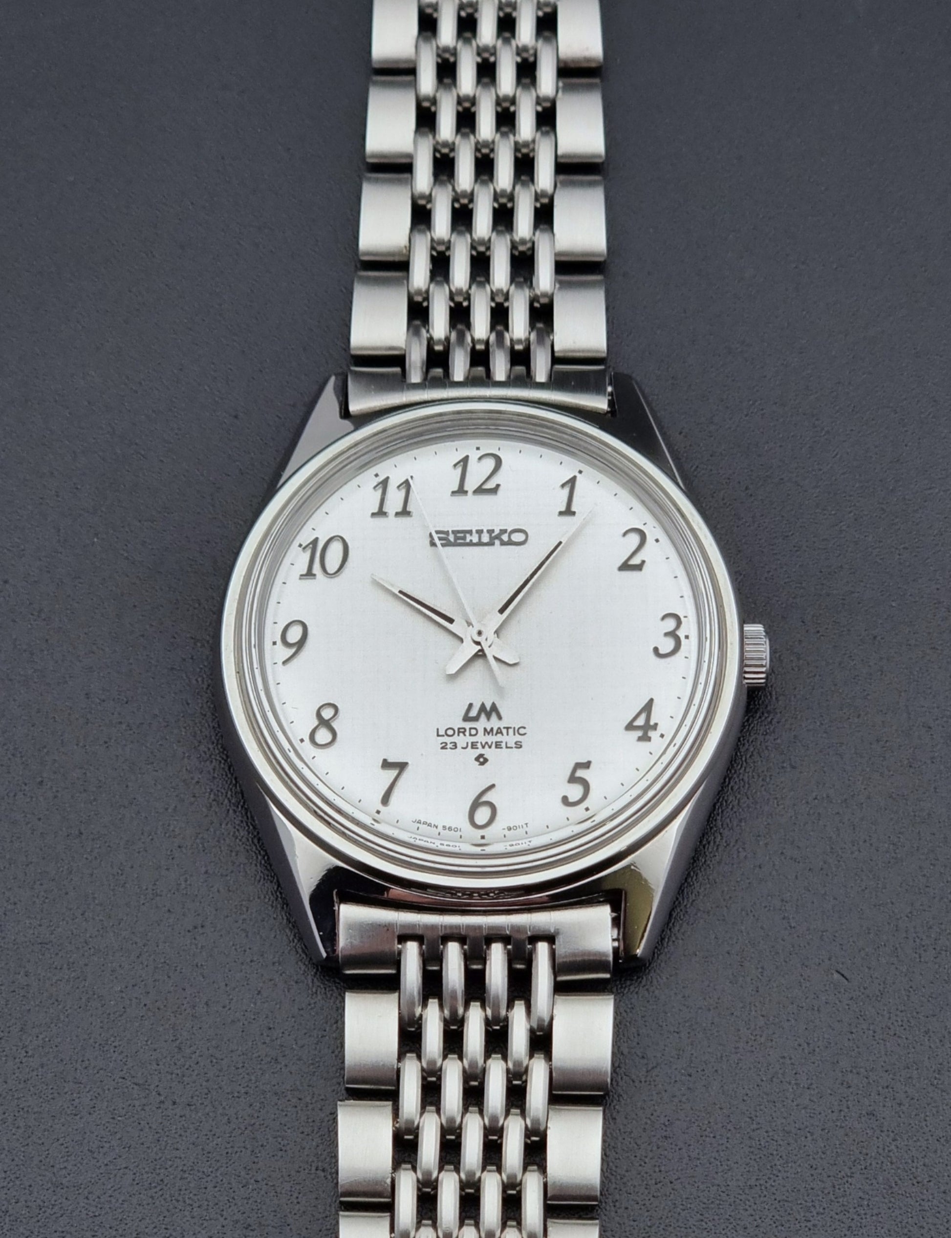 Vintage Seiko watch LordMatic 5601-9000  on a dark background front