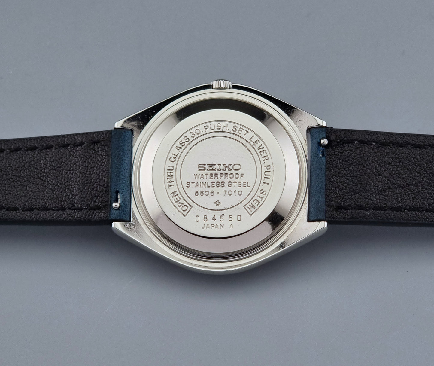 Back view of a Vintage Seiko Wristwatch LordMatic 5606-7010 on a blue strap