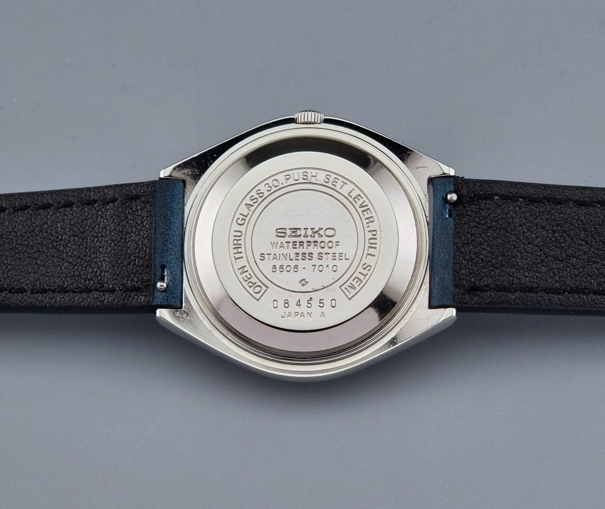 Back view of a Vintage Seiko Wristwatch LordMatic 5606-7010 on a blue strap