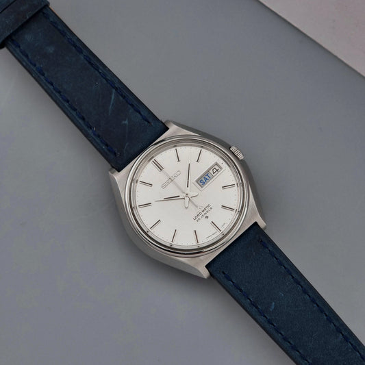 Vintage Seiko Wristwatch LordMatic 5606-7010 on a blue strap