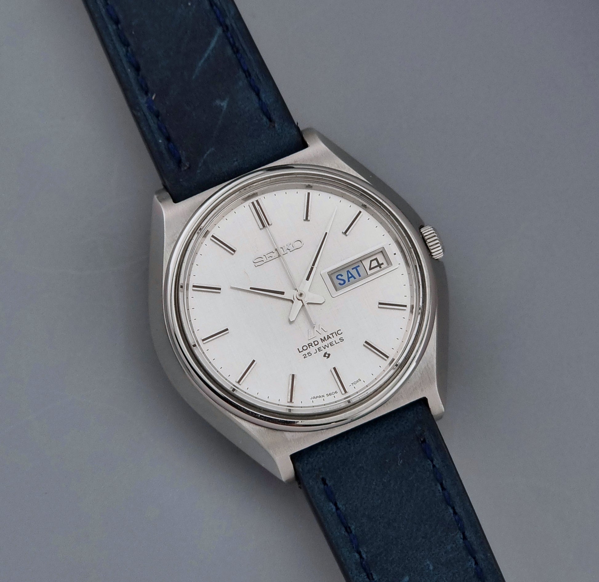 Vintage Seiko Wristwatch LordMatic 5606-7010 on a blue strap