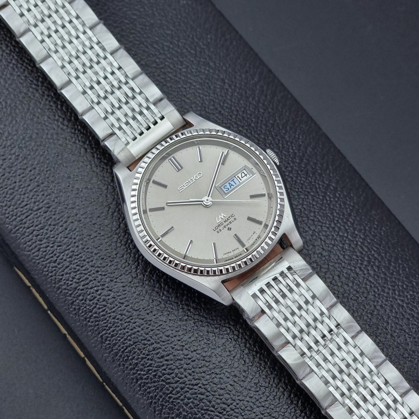 Seiko Wristwatch LordMatic 5606-7080  on a dark textured surface