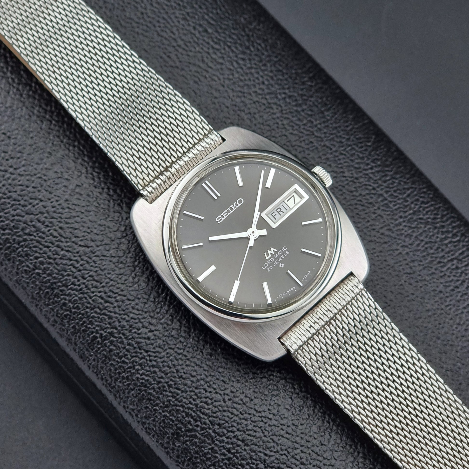 Vintage Seiko Lordmatic wristwatch on a dark background dial view