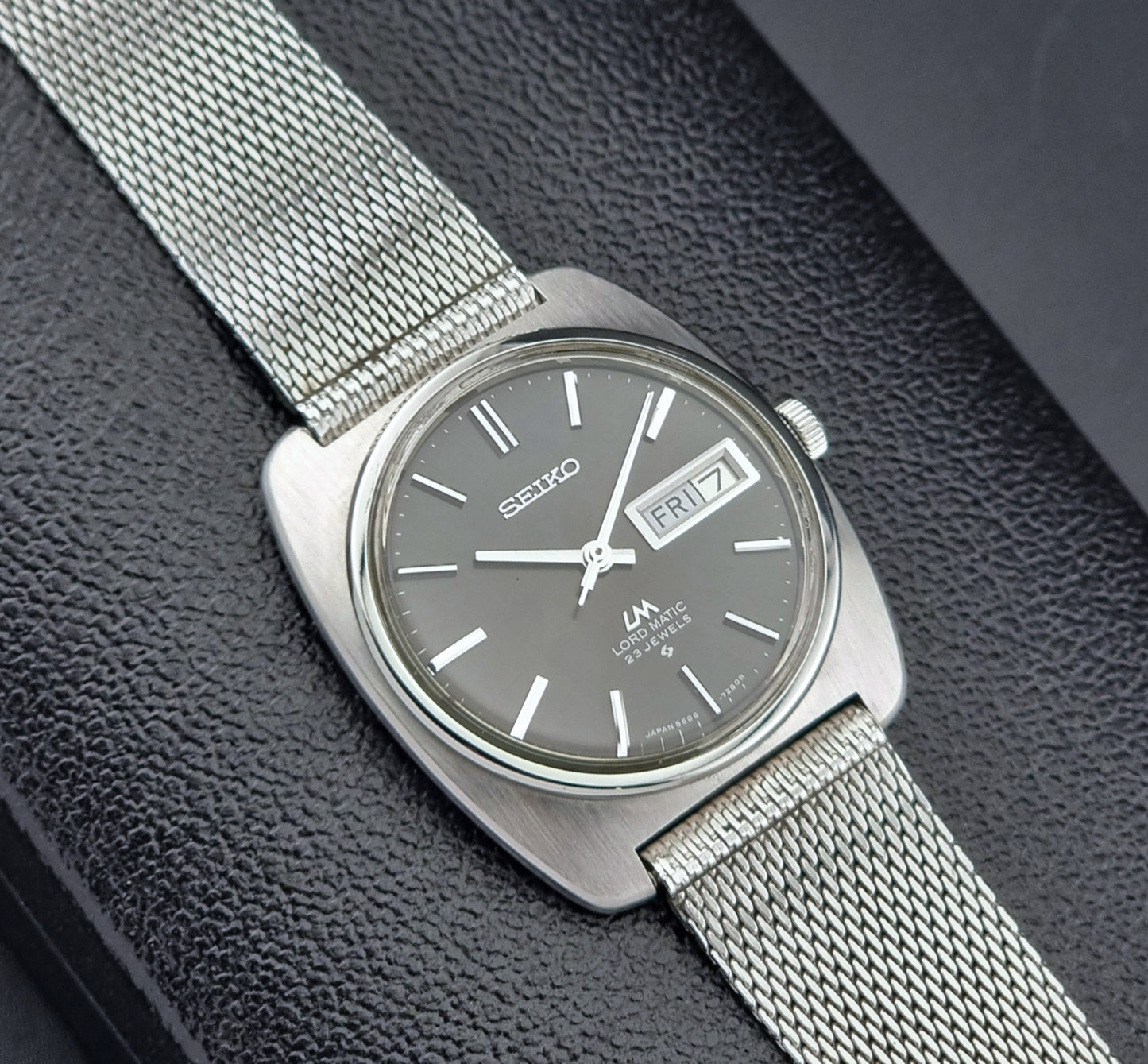 Vintage Seiko Lordmatic wristwatch on a dark background close dial view