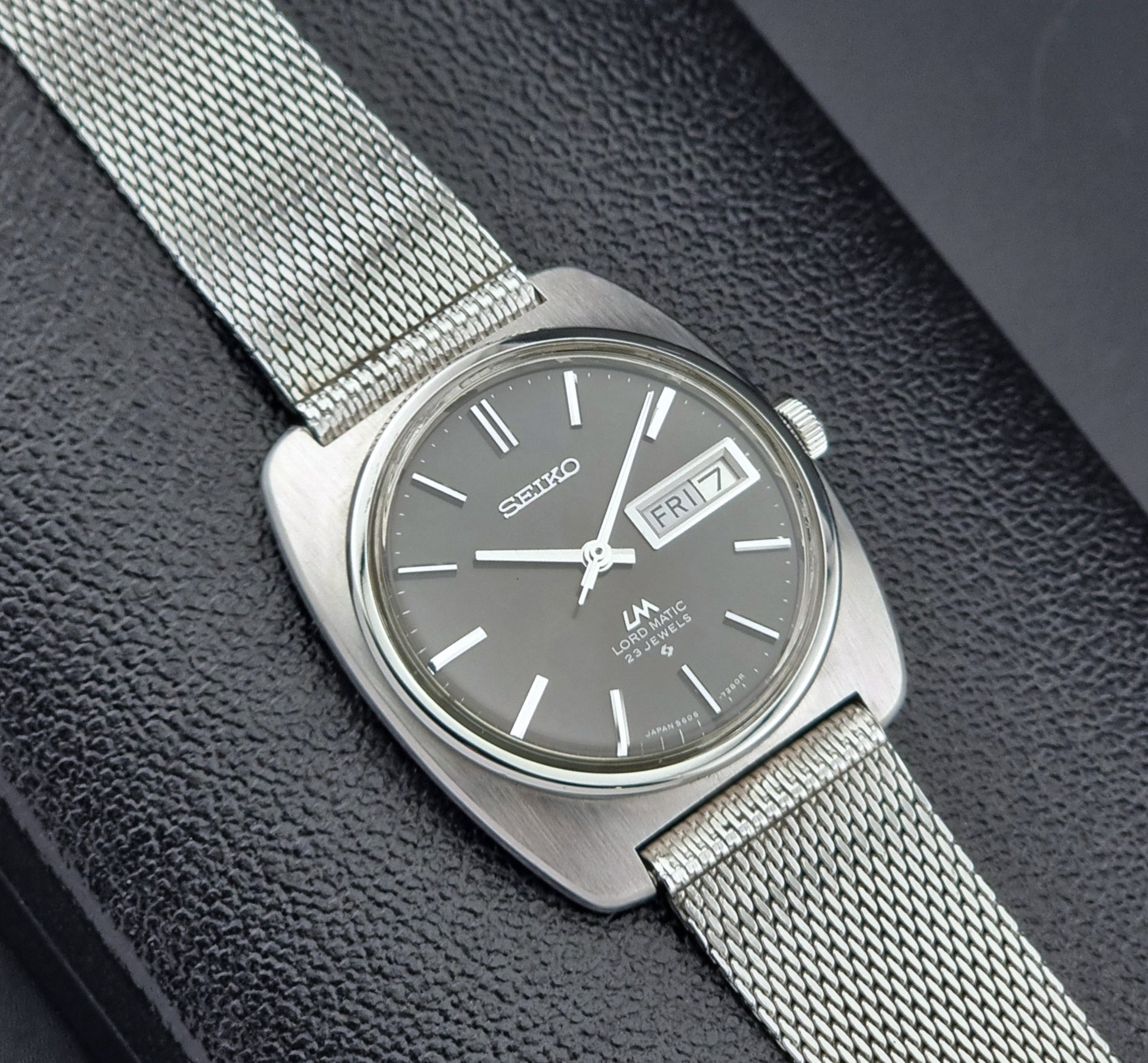 Vintage Seiko Lordmatic wristwatch on a dark background close dial view