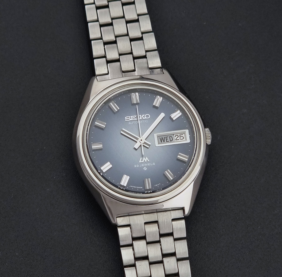 Vintage Seiko Lord Matic 5606-7260 blue dial automatic watch from 1973, angled front view