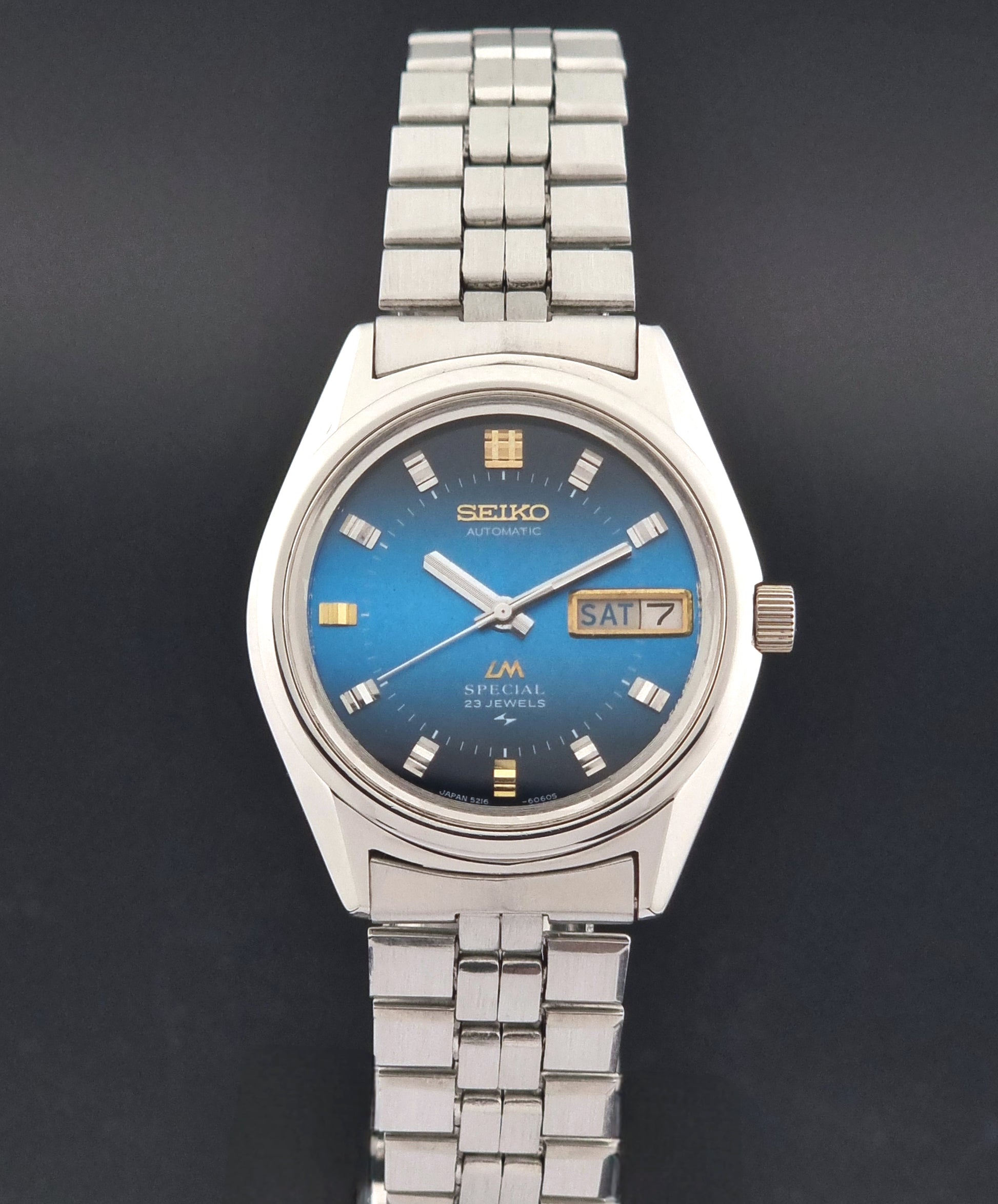 Vintage Seiko Wristwatch LordMatic Special 5216-6050 with blue dial on a dark background close dial view