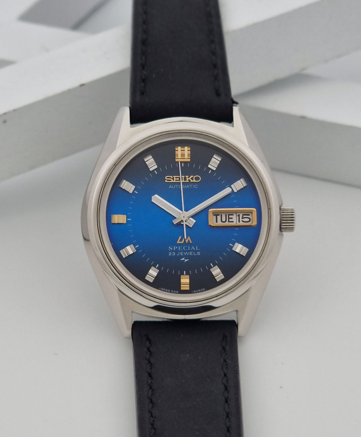 1973 vintage Seiko Lord Matic Special 5216-6050 automatic watch, alternate front view showing the blue dial with gold accents and case