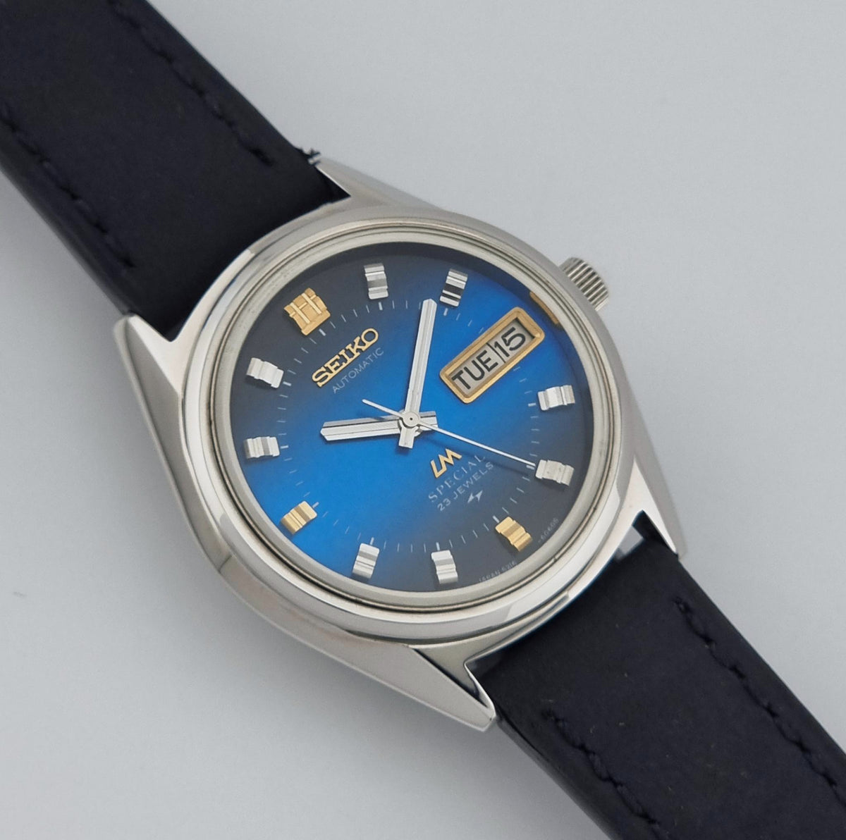 1973 vintage Seiko Lord Matic Special 5216-6050 automatic watch, front view highlighting the blue dial with gold accents