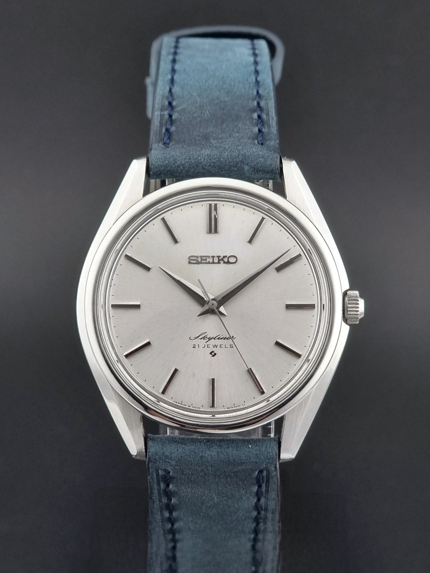 Seiko Skyliner 6100-8000 watch with blue leather strap on a dark background