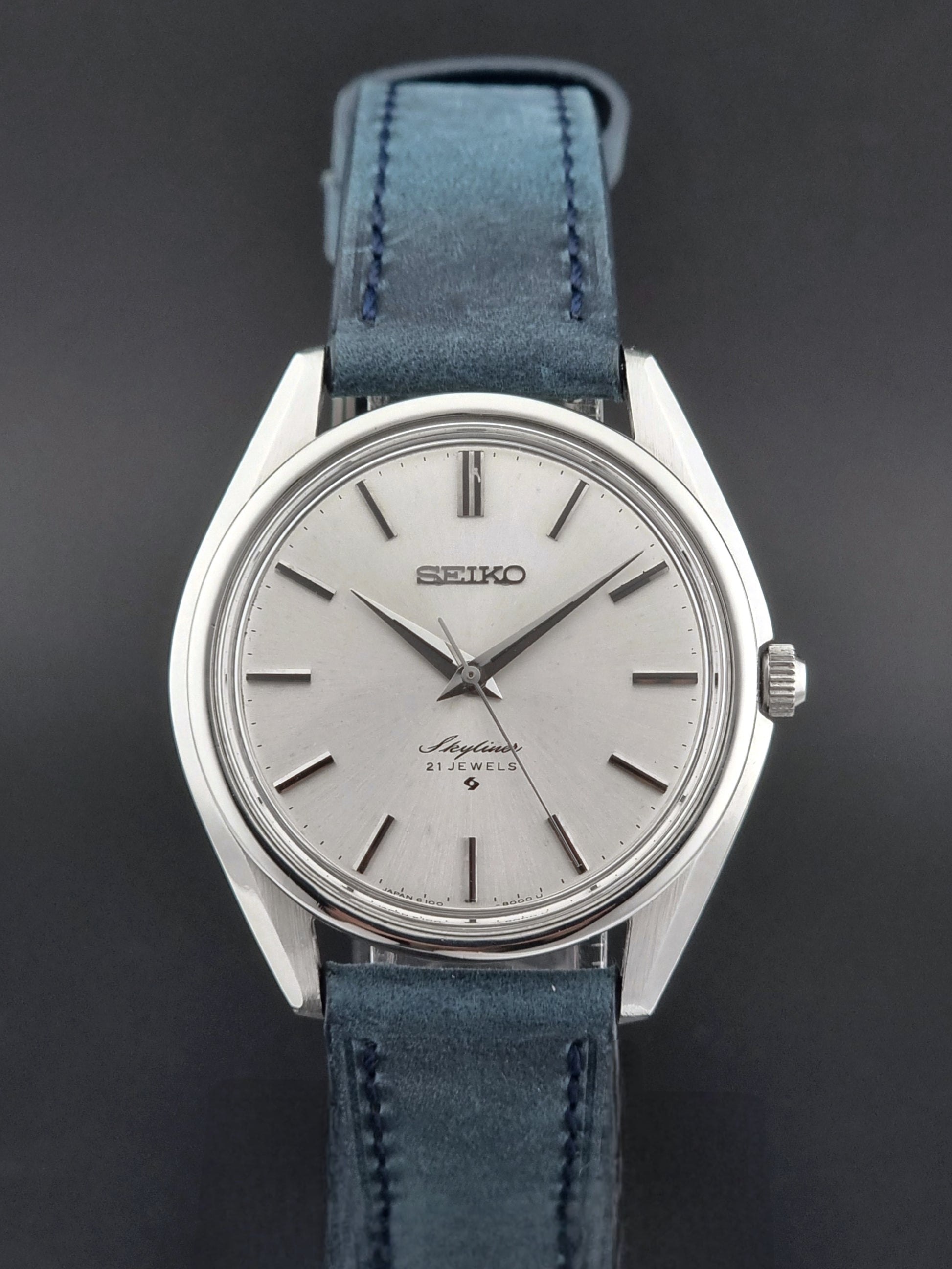 Seiko Skyliner 6100-8000 watch with blue leather strap on a dark background