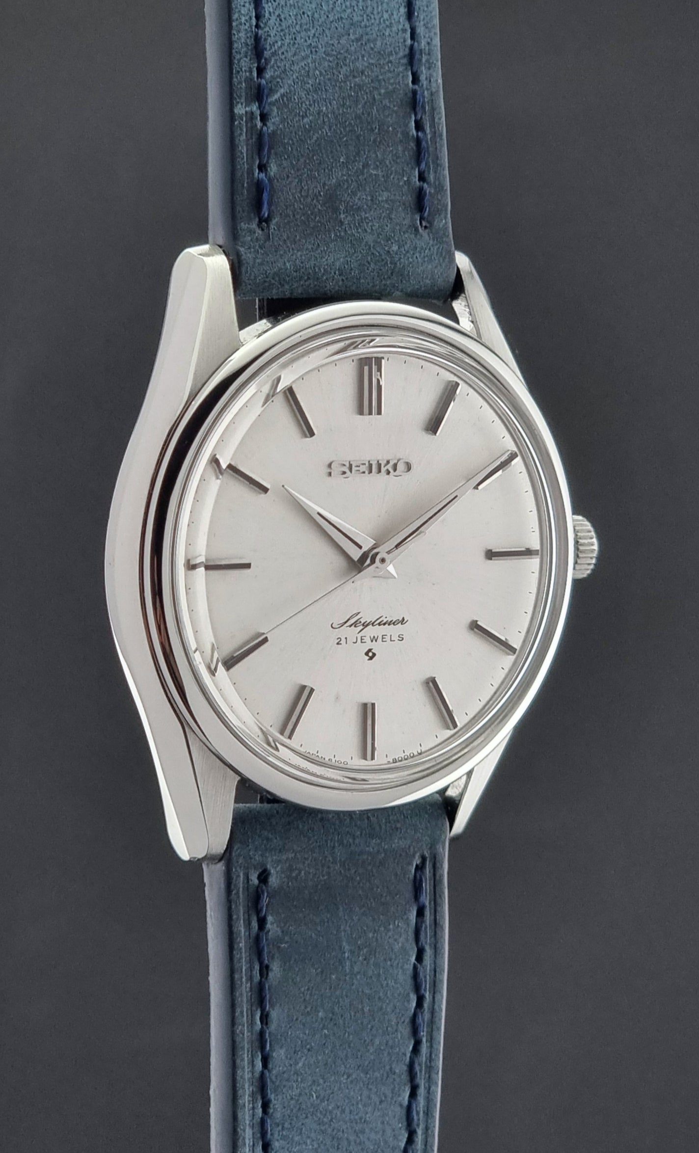 Seiko Skyliner 6100-8000 watch with blue leather strap on a dark background